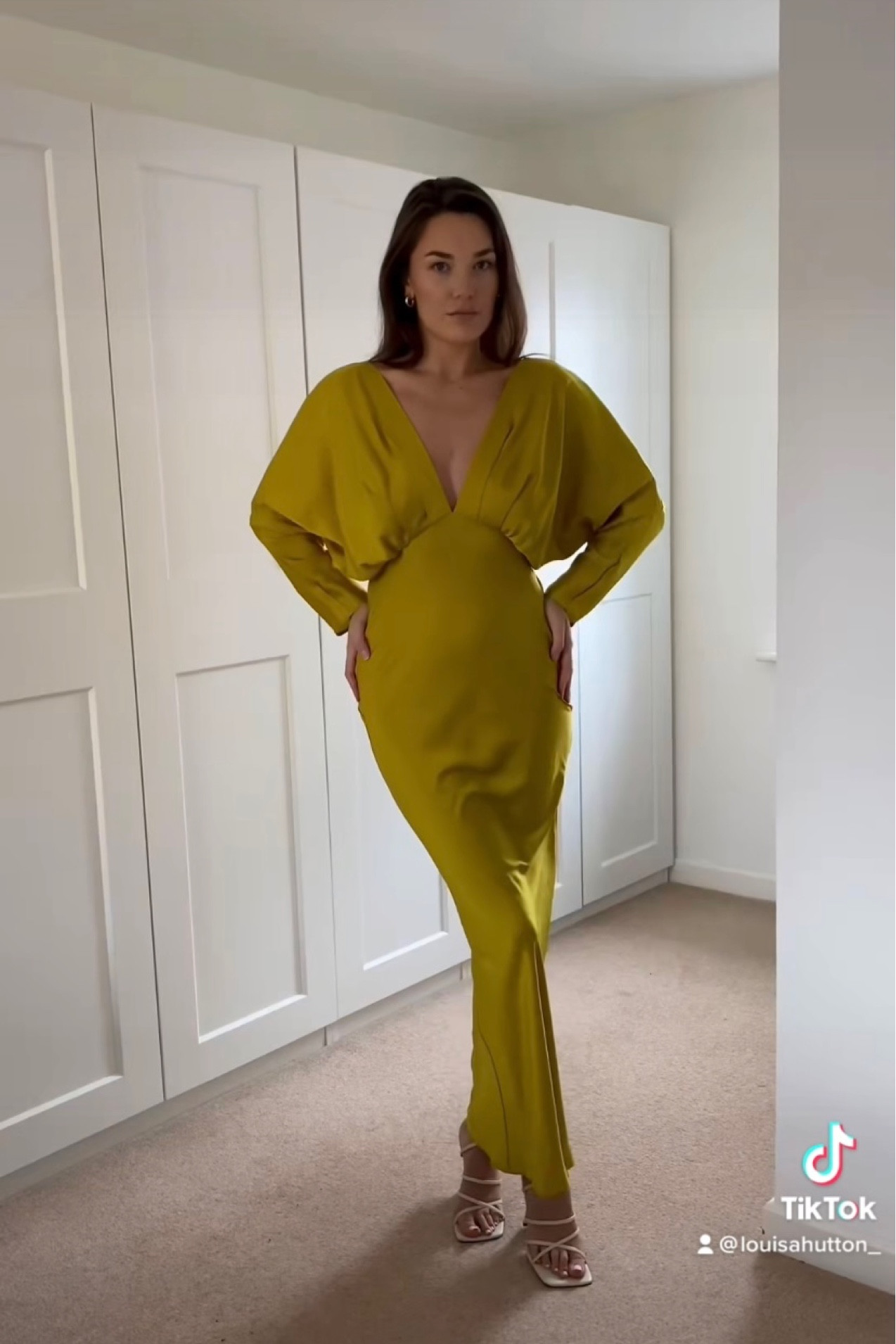 Gold/yellow coloured maxi dress with bat wing and deep v neckline.

#LTKFind #LTKwedding #LTKunder100
