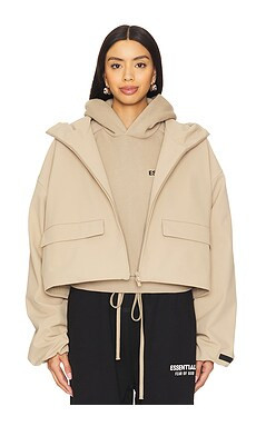 Fear of God ESSENTIALS Hooded Anorak in Desert Sand from Revolve.com | Revolve Clothing (Global)