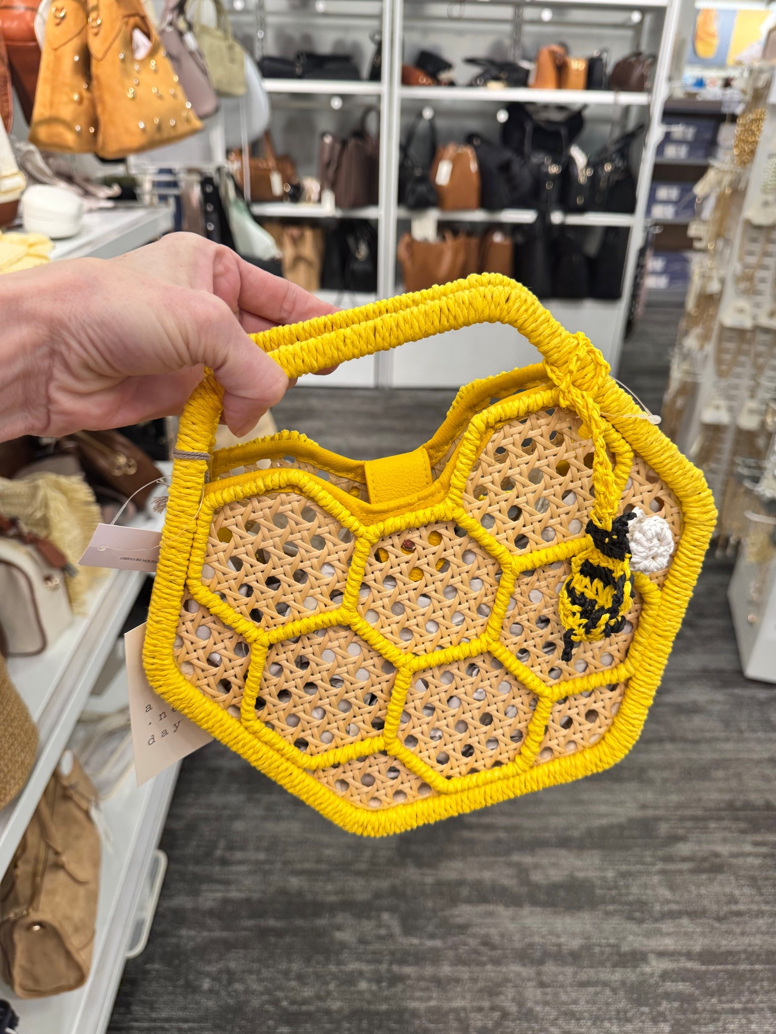 Stop everything… this honeycomb bag is the cutest thing I’ve seen all season 🐝💛

The woven texture + bright yellow detail + little bee accent?? It’s giving spring, summer, farmer’s market, patio lunch… all of it 🙌🏼

Such a fun statement piece that instantly elevates a simple outfit without trying too hard.

Perfect for:
• spring + summer outfits
• vacation looks
• brunch & patio days
• adding a pop to neutrals

If you love a unique accessory moment… this one’s a must 🐝✨

#targetfinds #springstyle #summeraccessories #handbaglover #momstyle #affordablefashion #wovenbag #statementpiece

#LTKselfcare #LTKFestival #LTKSeasonal