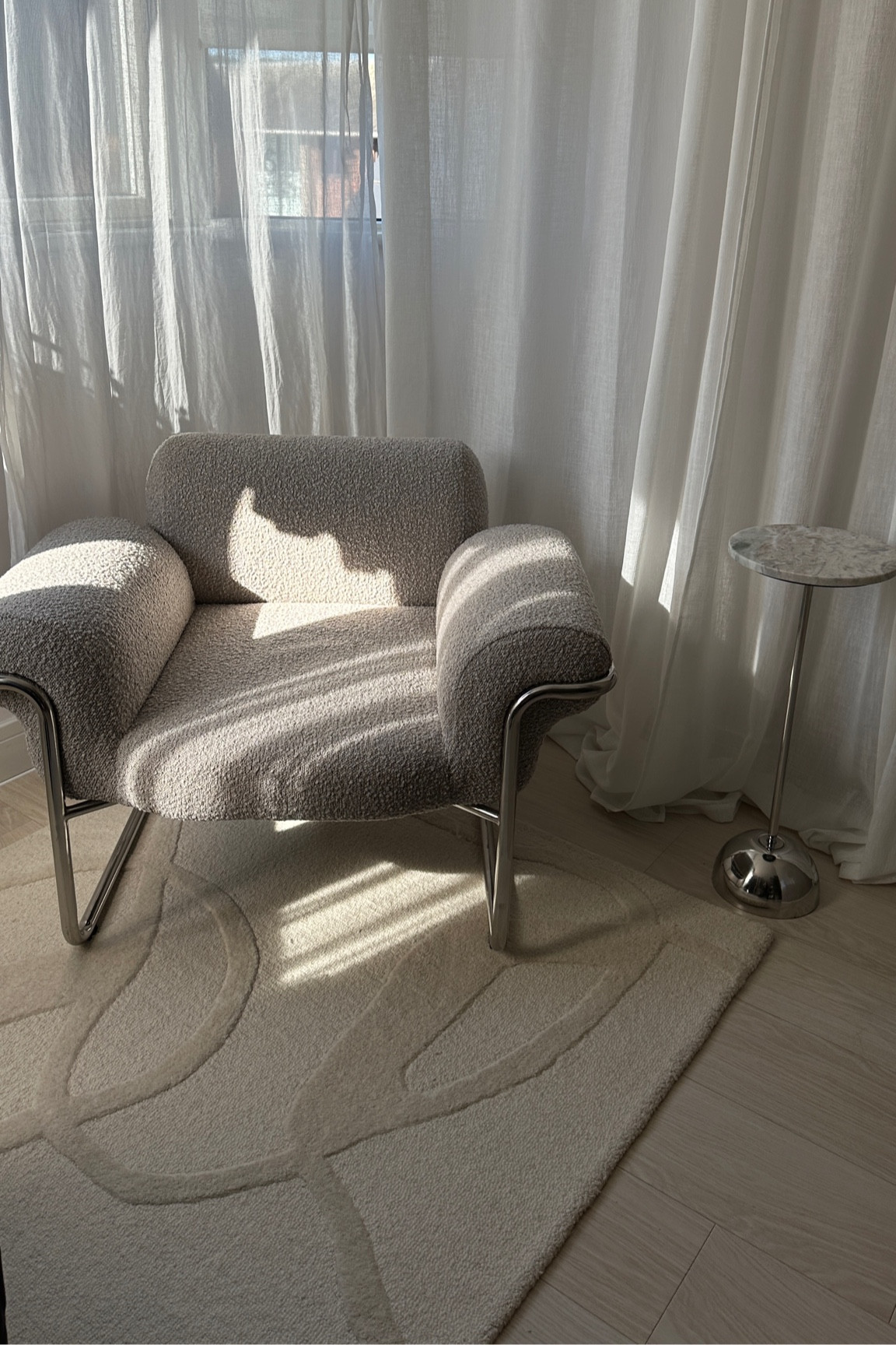 Cannot believe this chair is from H&M! 🤍🤍
Lounge chairs | mid century modern | home decor | boucle | chrome legs | armchair | interior design | minimalism | beige chair | light grey chairs | furniture | marble table 

#LTKeurope #LTKuk #LTKhome