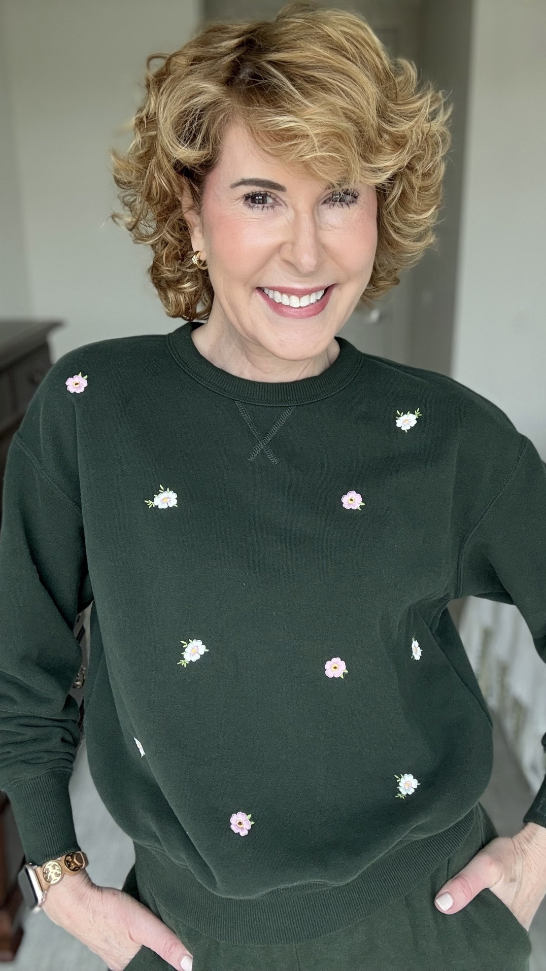 Dark green floral embroidered sweatsuit with a matching sweatshirt and joggers, styled with pink sneakers for a cute, casual pop of color. An easy fall athleisure outfit for travel, errands, lounging, or everyday wear, with cozy matching-set style and feminine floral details.

#LTKootd #LTKgrwm #LTKOver40