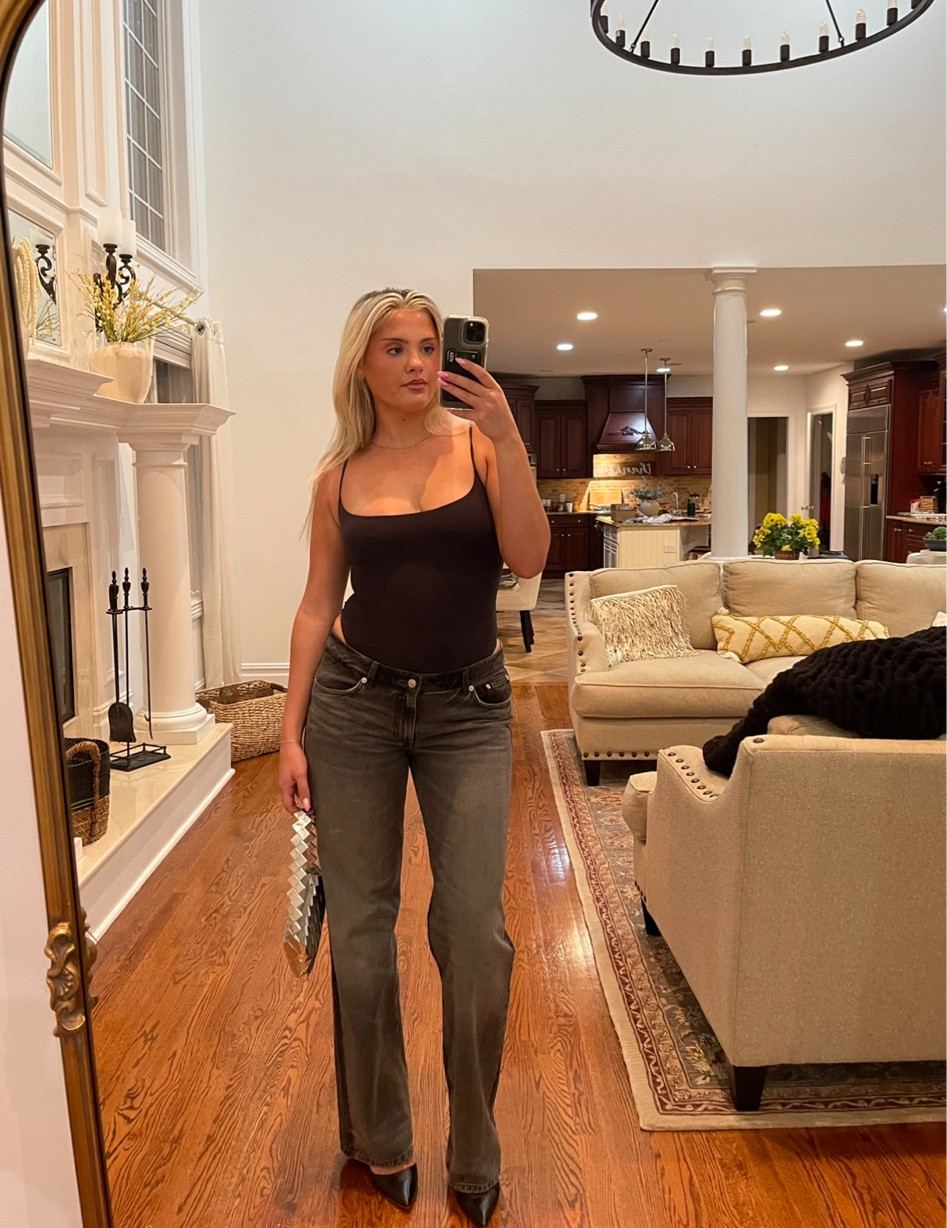 For the perfect casual night out, combine the sleek black bodysuit with a pair of blackish-grayish jeans for a modern and sophisticated look. The bodysuit offers a flattering silhouette, while the jeans add a touch of edginess and versatility. Complete the outfit with a pair of stylish pointy heels to elevate the ensemble and add a touch of sophistication. This ensemble strikes the ideal balance between comfort and style, making it perfect for a night out on the town.

#LTKfindsunder100 #LTKU #LTKworkwear