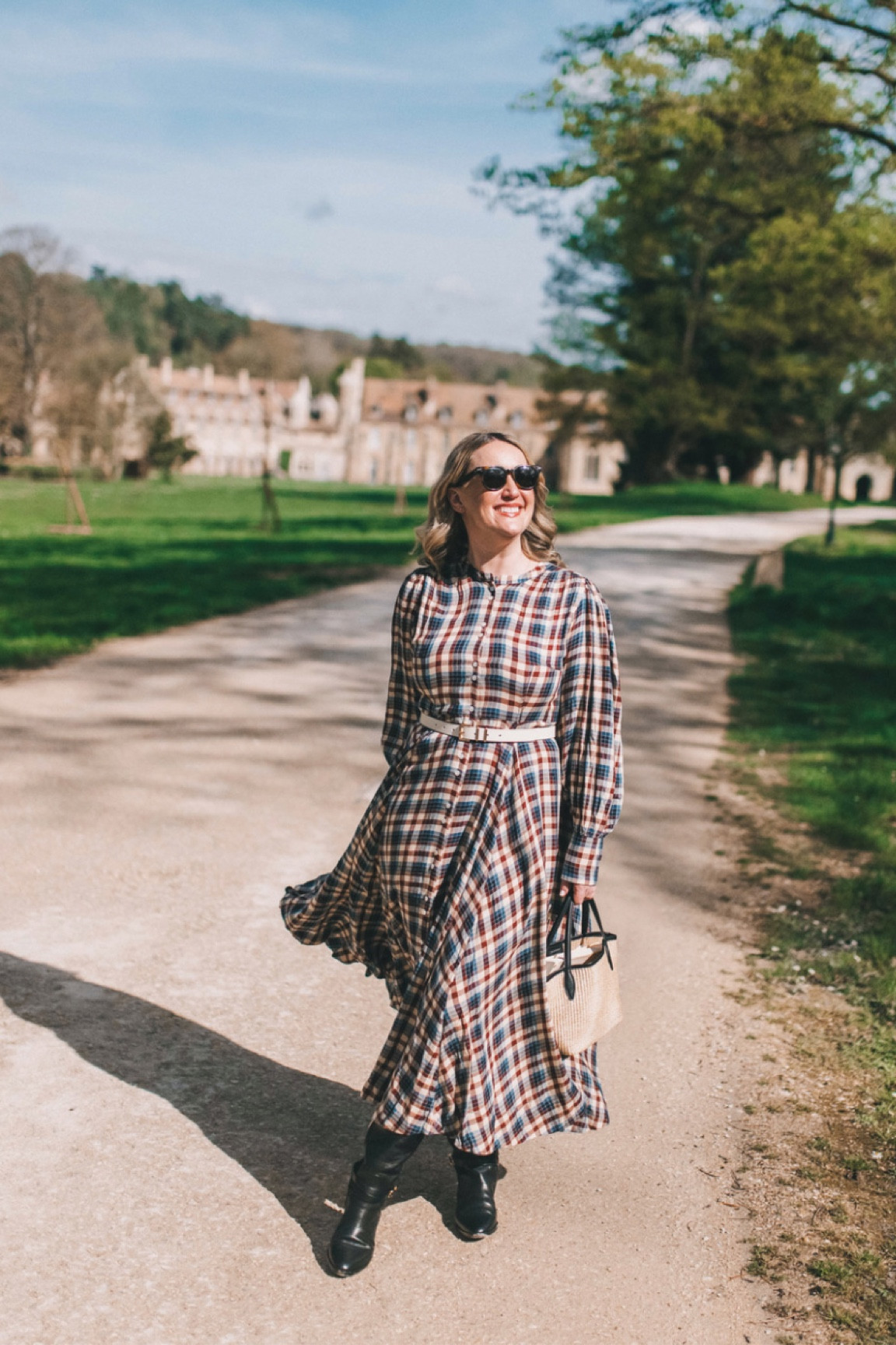Doen checked dress (L) plaid midi dress
Abercrombie belt
Madewell raffia tote
Riding boots 
Country style 

#LTKSeasonal