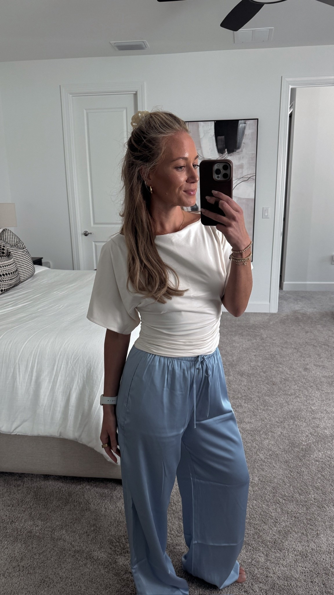 The @abercrombie  satin pants are a staple piece. I'm loving them in this light blue for Spring/Summer, they re so versatile you could dress them up for a date night outfit or wear with flip flops and a tank for a more casual vibe.
They sold out instantly during the holiday season. Paired it with this gorgeous flowy sleeved top. Wearing a S in both.

Abercrombie satin pants, satin pull on pants, Abercrombie spring finds, Abercrombie new arrivals 

#LTKootd #LTKSeasonal #LTKSaleAlert