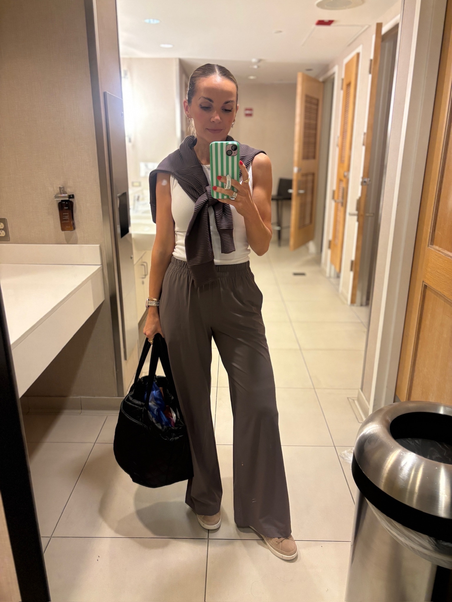 My go-to chic travel day outfit with the best, softest pants!