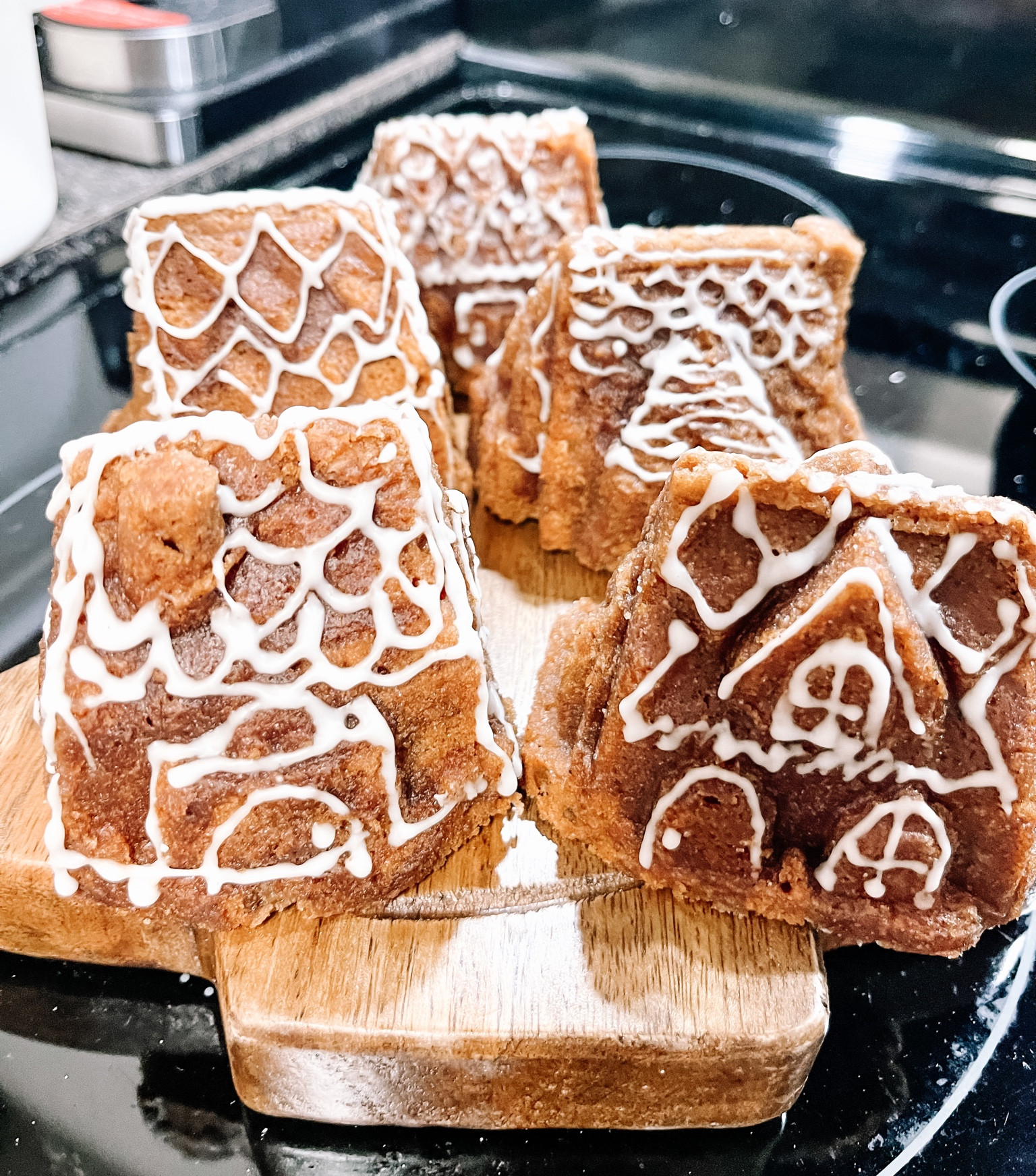 Baked orange gingerbread cakes in a Nordic Ware Cozy Village baking pan mold  

#LTKHoliday #LTKhome #LTKSeasonal