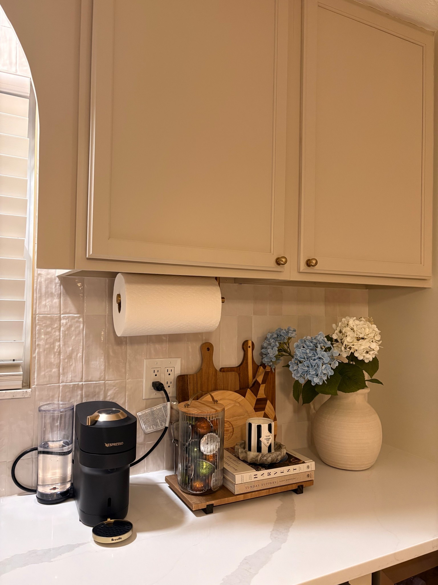 Spring refresh! Added hydrangeas to my cozy coffee bar with wood accents, stacked cookbooks and my Nespresso machine. Modern organic kitchen styling that feels fresh for the season! Plus everything is on sale! Love spring sales! Run! 🏃‍♀️ 

spring kitchen decor ideas, neutral coffee bar styling, beige kitchen aesthetic, modern organic kitchen decor, Nespresso setup


#LTKSaleAlert #LTKHome #LTKSpringSale