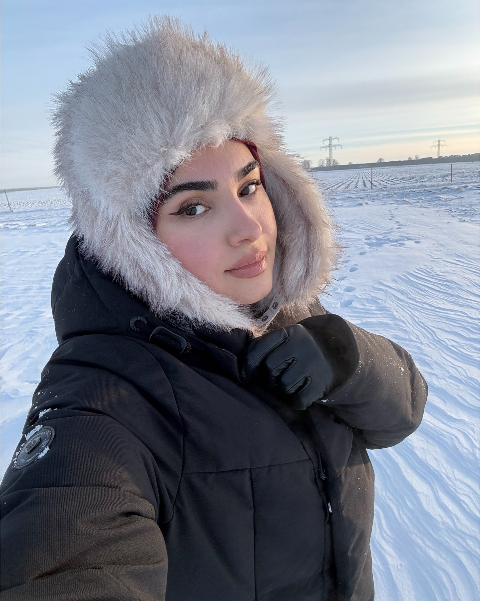 Snowy days like that ❄️🤍 love my new ear - flap beanie 

#LTKeurope #LTKwinter #LTKbeauty