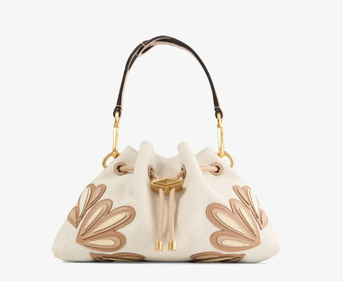 A timeless everyday luxury bag 🤎 The Jimmy Choo Cinch Small in Natural & Chai pairs recycled canvas with beautiful leather trim and signature logo detailing. The perfect neutral designer shoulder bag to elevate everything from denim to tailored looks.

#LTKStyle #LTKHandbags #JimmyChoo #LuxuryFashion #DesignerBag #QuietLuxury #EverydayLuxury 

 #LTKmomlife #LTKOver40 #LTKTravel