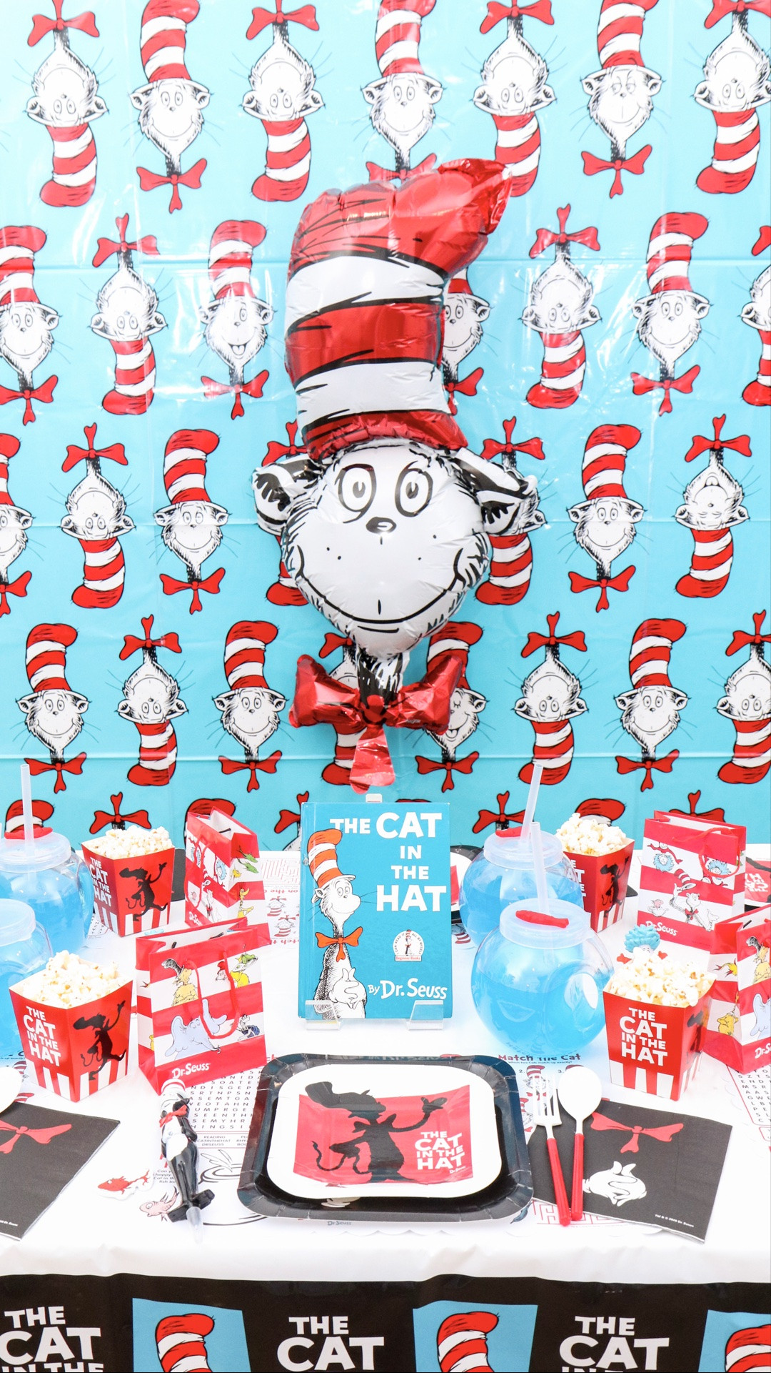 If your little one knows The Cat in the Hat™ by heart, this party is for them! 🎩#OTCPartner
 
Some books get read so many times the corners go soft — so I made this one come to life. The Cat himself, the fish in his bowl, Thing 1 and Thing 2 all showed up.
 
My favorite part is the treat booth. Instead of pre-filled favor bags, the kids get to "shop" it and fill their own. One thing I've learned: kids LOVE picking for themselves (and it's one less job for you before the party!).
 
With the new movie out this November, it would make the cutest movie-night party too 🍿
 
code YAY for free shipping on $25+.
 
Save this for later and follow for more parties inspired by the things they love!
 
#orientaltrading #catinthehatparty #drseussparty #kidspartyideas

#LTKmomlife #LTKKids #LTKstorytime