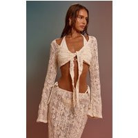 Cream Flower Embroidered Long Sleeve Tie Front Beach Top | PrettyLittleThing UK