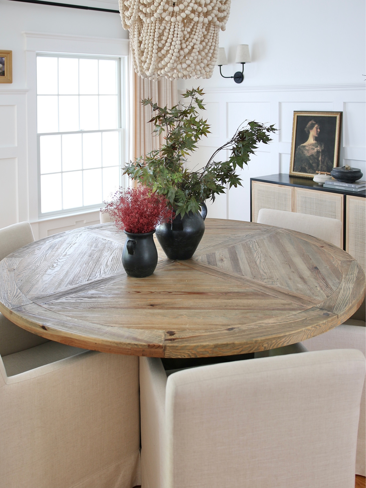 This is a closer view of the rustic farmhouse pine wood round pedestal dining table. The finish is definitely textured but not rough and has been easy to clean up

#LTKstyletip #LTKhome #LTKFind
