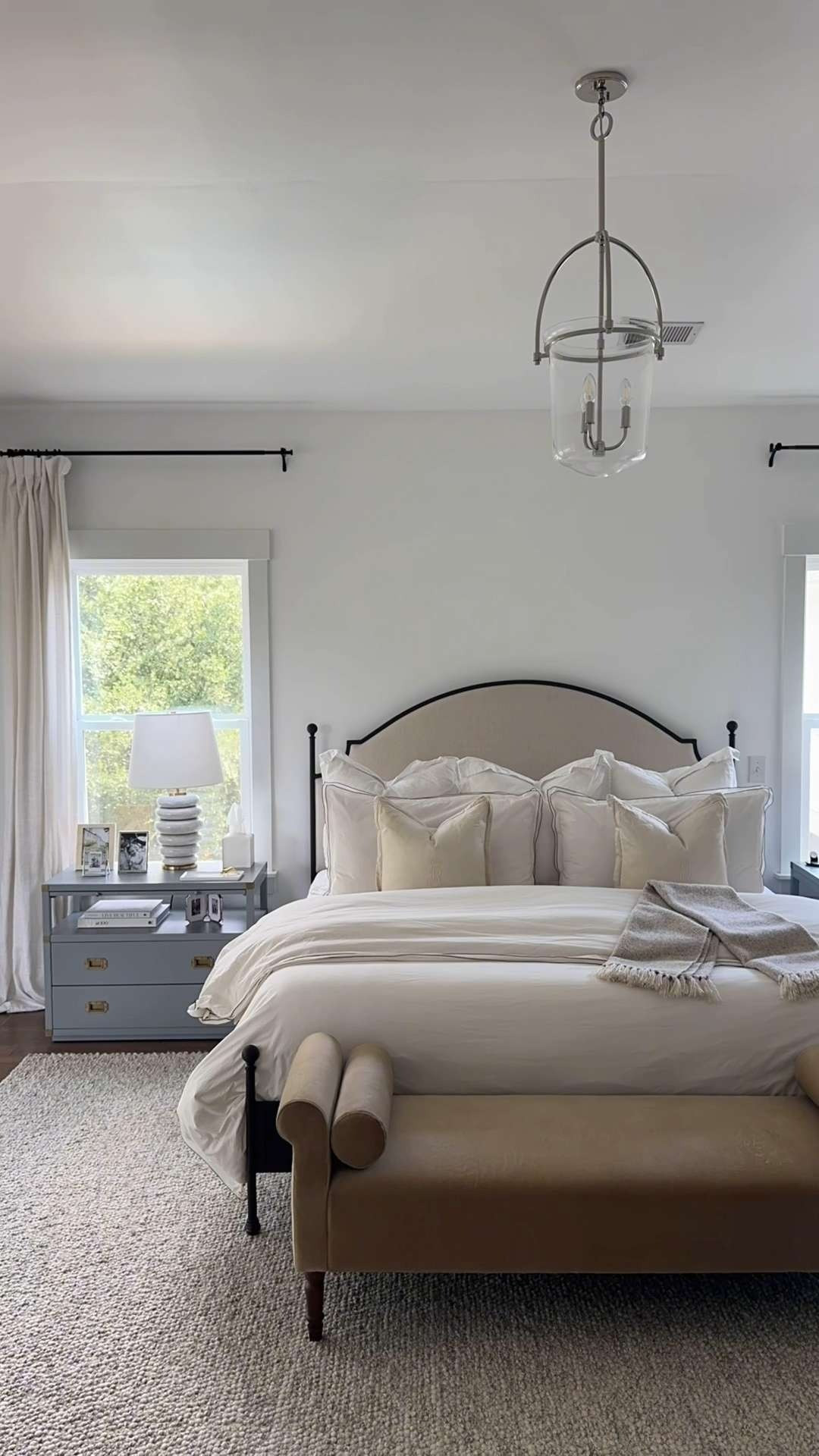 my bedding & bedroom links 🤍🤎 my exact bed is from #potterybarn and discontinued, but I’ve linked something similar.  

also loving my workout onesie seen here & linked below. 
 
#bedroom #bedroomdesign #bedding #mcgeeandco #nightstands #curtains #sheets  

 #LTKHome #LTKSaleAlert #LTKStyleTip