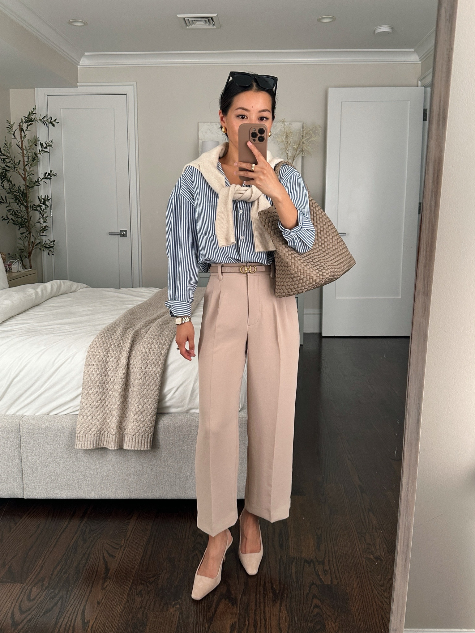 Easy classic fall work outfit with the best crepe cropped pants 

• Aritzia crop effortless pants size 0 regular - I’m between their pant waist sizes: a 00 fits 24” waist and a 0 fits me (25.5” waist). This is the cropped style in the regular length (not short).

J.Crew Sydney pant linked has a similar fit but in a thicker material. 

• Edited Pieces belt xxs (stocked at editedpieces.com) 

 • Old Navy oversized stripe shirt xxs - exact shirt is stocked in other colors and I linked a similar Everlane option as well. The Everlane one is not as oversized, and is a really good staple I’ve owned for years in two colors.

• Naghedi medium tote in the color “cashmere" - gorgeous neutral color 

• Ann Taylor slingbacks - linked similar, I’ve tried the Nordstrom on and it’s the closest shoe I’ve found in a neutral color.


#LTKitbag #LTKworkwear 

#LTKSeasonal