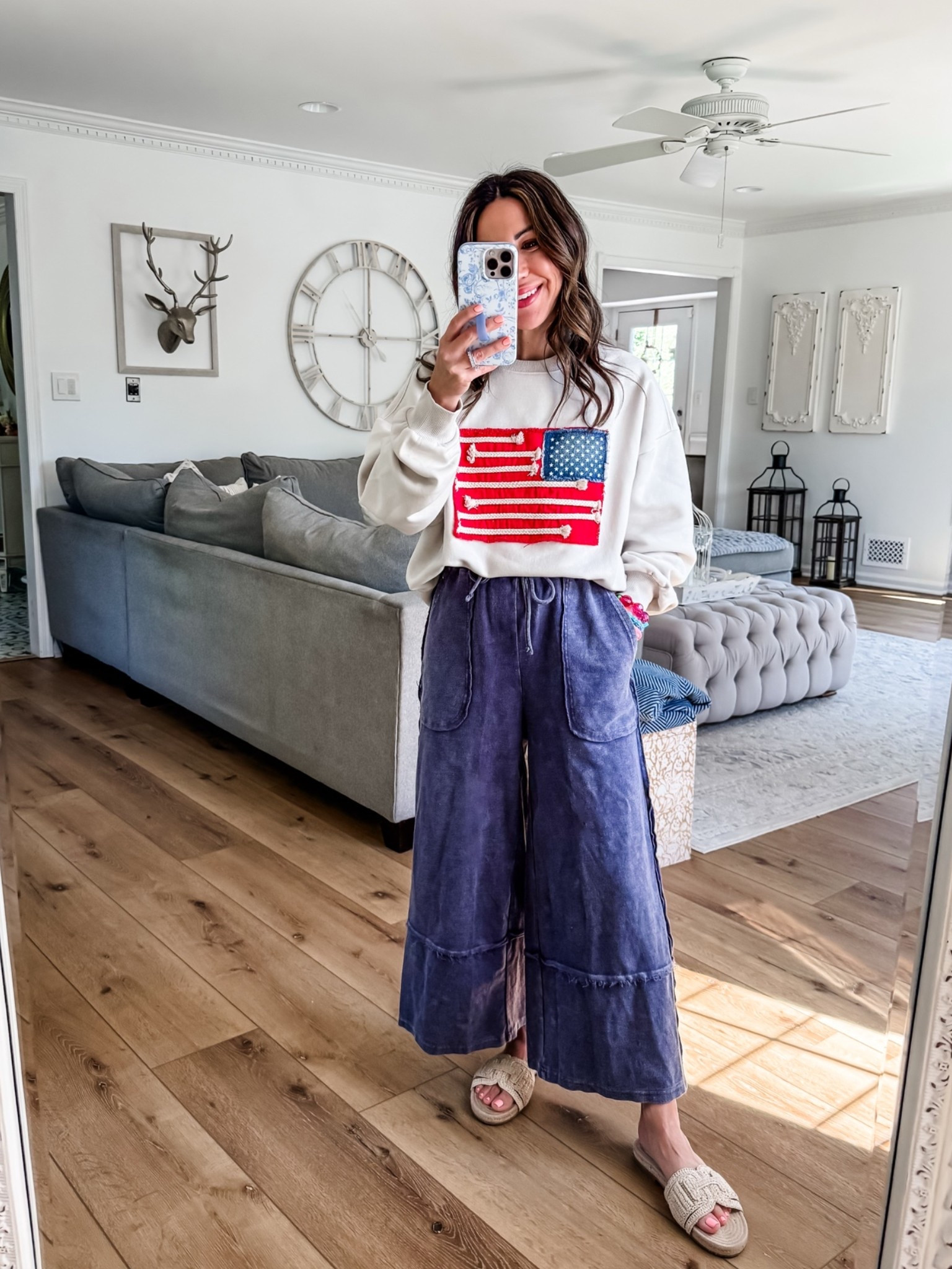 Small black sweatshirt. Small wide leg pants. Sandals TTS.

#LTKOver40 #LTKPetite