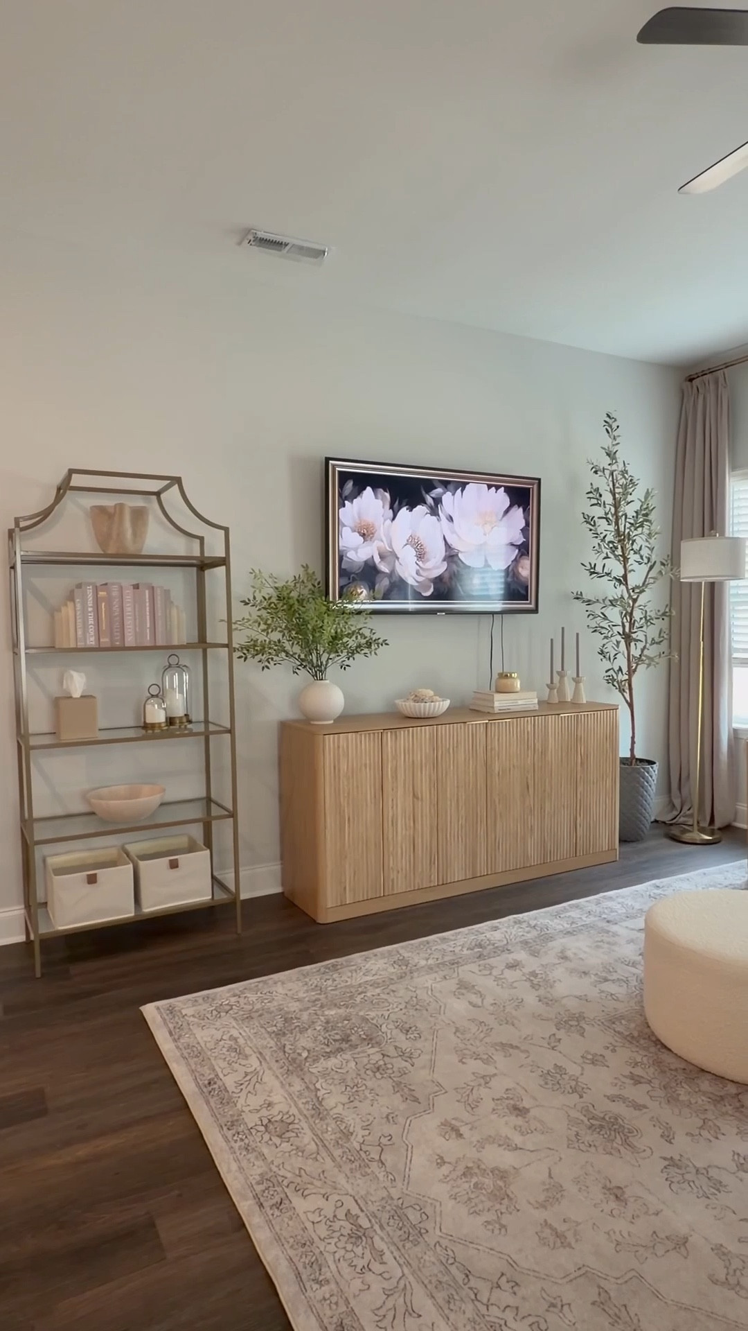A little living room styling moment… with a hidden mom hack.🤍

I fell in love with this fluted wood console for the texture and warm tones—but the real win is what you don’t see at first glance.

Inside = our everyday toy storage.

I wanted our living room to feel calm, cohesive, and grown-up—while still being fully lived in. So I styled the top with a few neutral decor pieces, kept the palette soft and layered, and turned the cabinet into hidden toy organization that resets in seconds.

Because an aesthetic home and real life with kids can coexist.

✨SAVE this for your future living room reset
✨SHARE with a mom who knows the toy struggle 
✨Comment SHOP for details on what I used
✨FOLLOW me for more functional home decor

fluted furniture, fluted console, living room styling, hidden toy storage, toy organization, neutral home decor, aesthetic home, modern organic home, living room organization, family friendly home, clutter free living 
#aestheticdecor #organizedhome #toyorganization 


#LTKmomlife #LTKKids #LTKHome