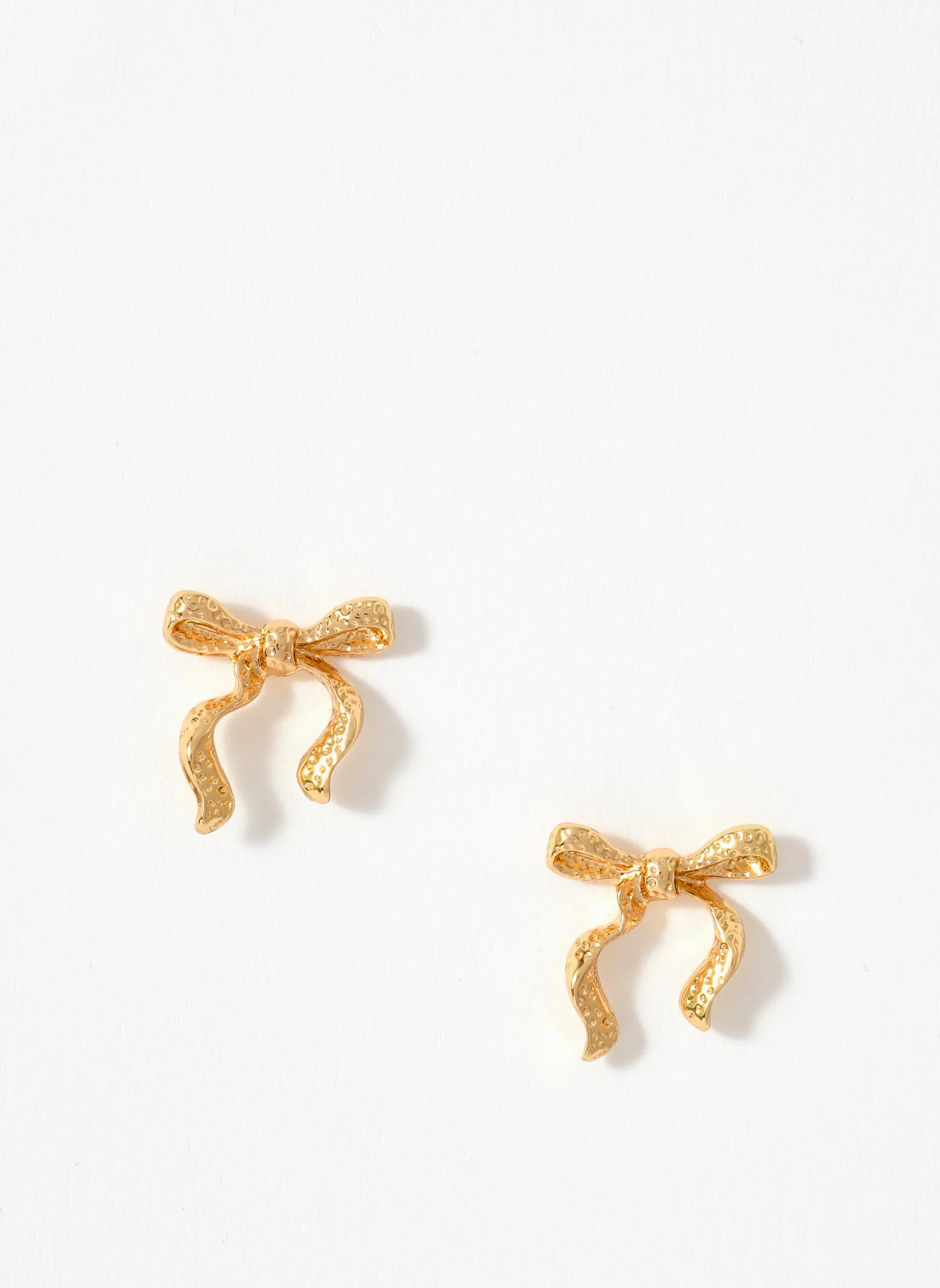 Gold Tone Textured Bow Stud Earrings | Mint Velvet