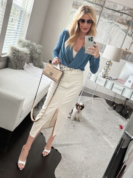 Loving this ivory denim midi skirt for spring! The fit is impeccable and I love the sexy slit up the front! It runs tts, I’m wearing a size 00. 

#LTKover40 #LTKfindsunder100 #LTKstyletip
