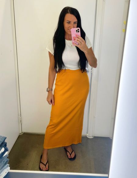Old Navy Teacher favorite of mine— the skirt comes in 4 colors! This one came home with me😍 It’s so nice for going back to school! ✏️ 

SIZING:
•The ribbed skirt is my absolute favorite thing in store right now! I did size up to a M so it was less of a bodycon fit but I don’t think you’d have to size up. It’s ribbed material with one side slit.

#ltkunder50 #oldnavy • teacher outfit • midi skirt • ribbed skirt • 

#LTKFind #LTKsalealert #LTKBacktoSchool