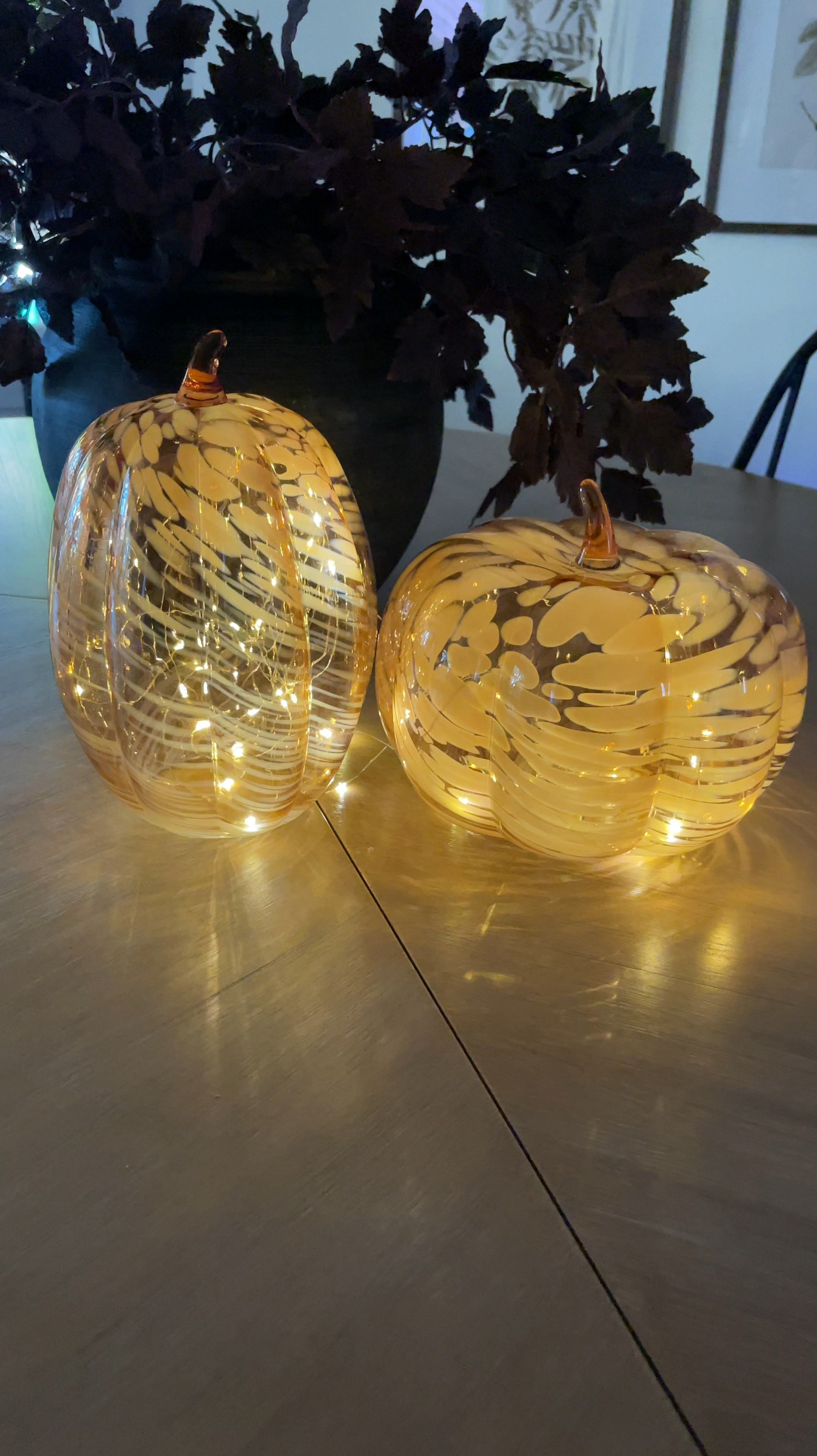The glass marble effect pumpkins come in two sizes and are less than $15! 

I added battery twinkle lights to mine, but a battery tea light candle would be beautiful too! 


#LTKStyleTip #LTKHome #LTKFindsUnder50