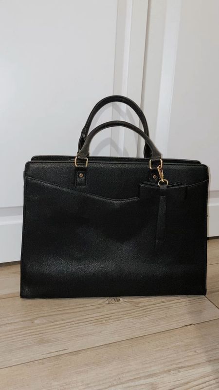 Spacious Amazon briefcase with laptop slots and pockets 

#LTKfindsunder50 #LTKworkwear #LTKtravel