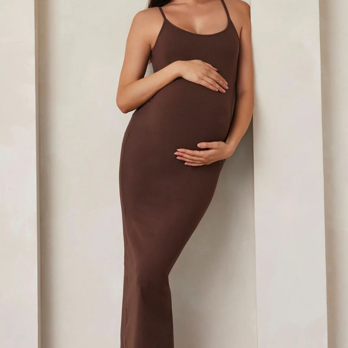 Shop The Sculpting Rib Maxi Maternity Bumpsuit dress | BUMPSUIT Maternity | BUMPSUIT