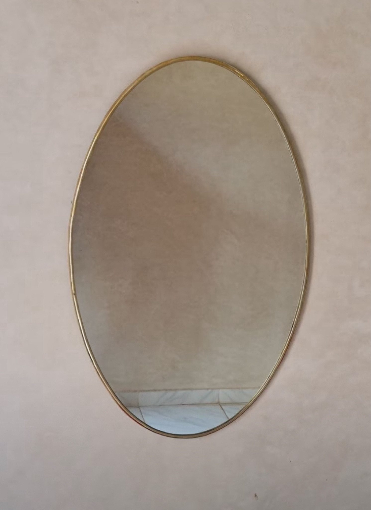 Beautiful antique brass mirror, as seen in our Queen Anne Contemporary Craftsman powder room. 

#LTKhome