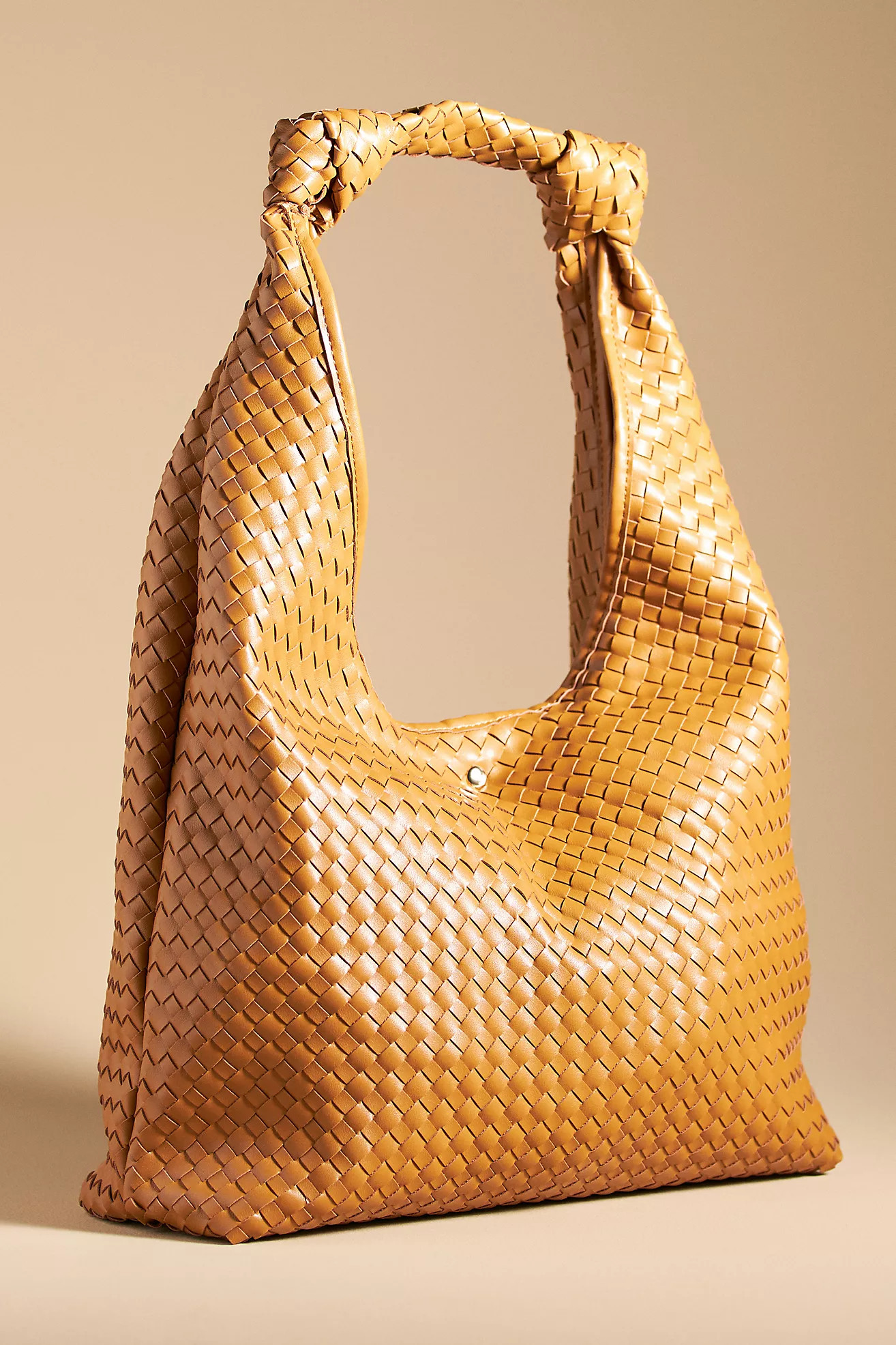The Love Knot Faux Leather Bag: Woven Edition | Anthropologie (US)