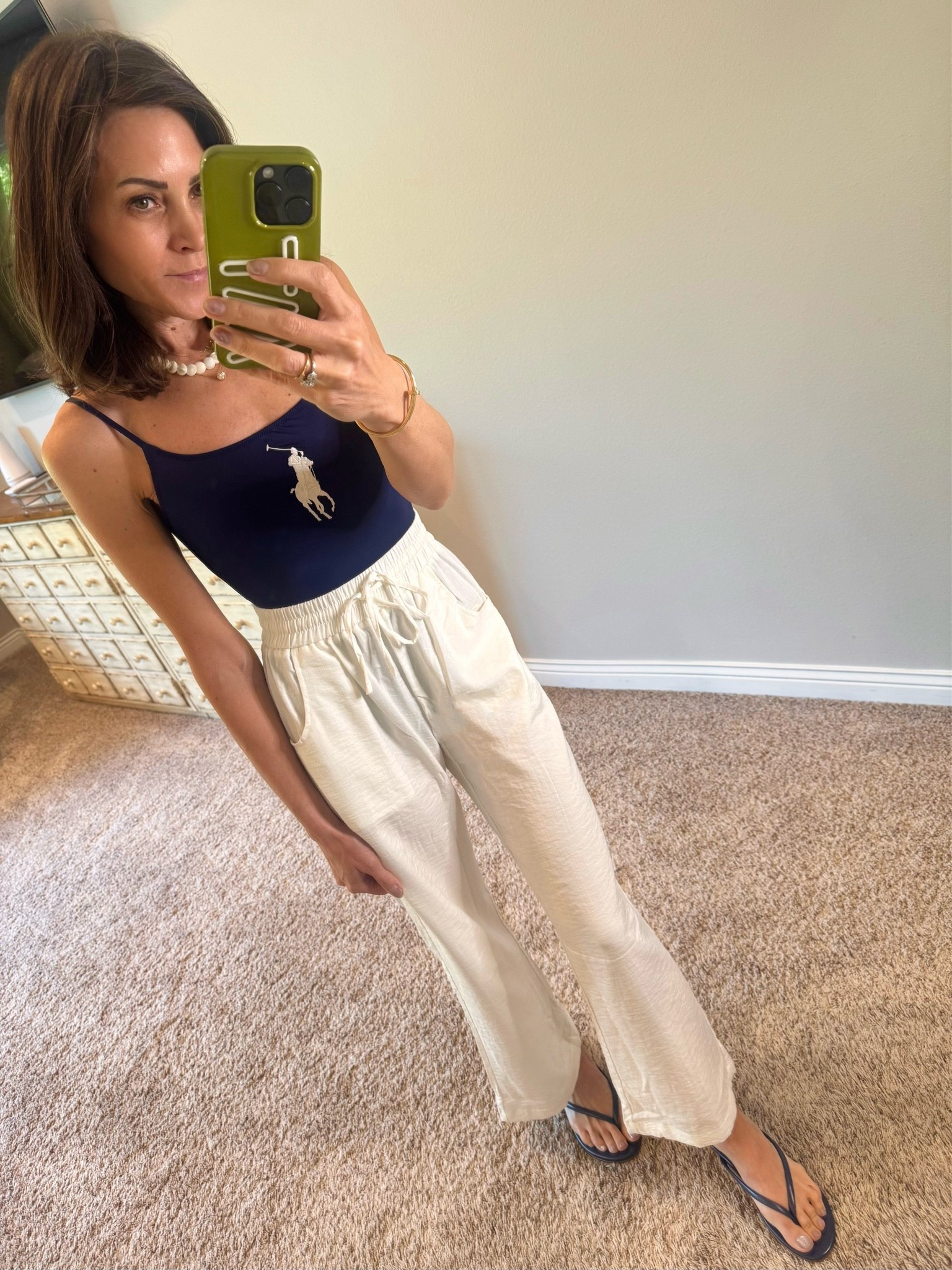 Best Am@zon pants! Love these tts. They come in lots  of colors and short/regular/long lengths.

Best swimsuit-trs comes in black and navy
Flip Flops-tts (and have arch support, so comfy)

#LTKSwim #LTKOver40 #LTKSeasonal