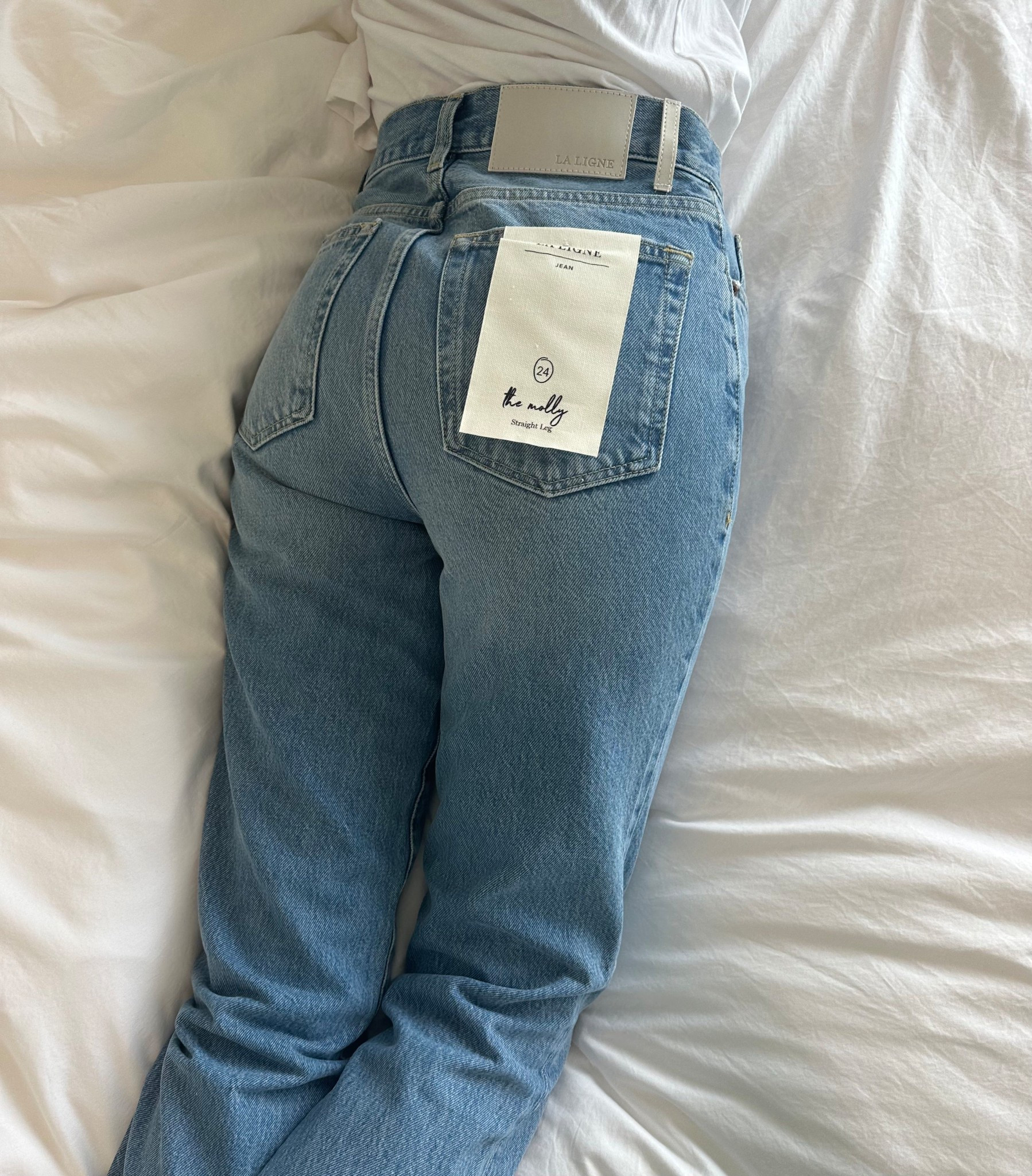 A closer look at the denim you’ll live in. The Molly High-Rise Straight Jeans from @lalignenyc are the perfect balance of structure and comfort, with a leg-lengthening cut that pairs effortlessly with everything. #ad