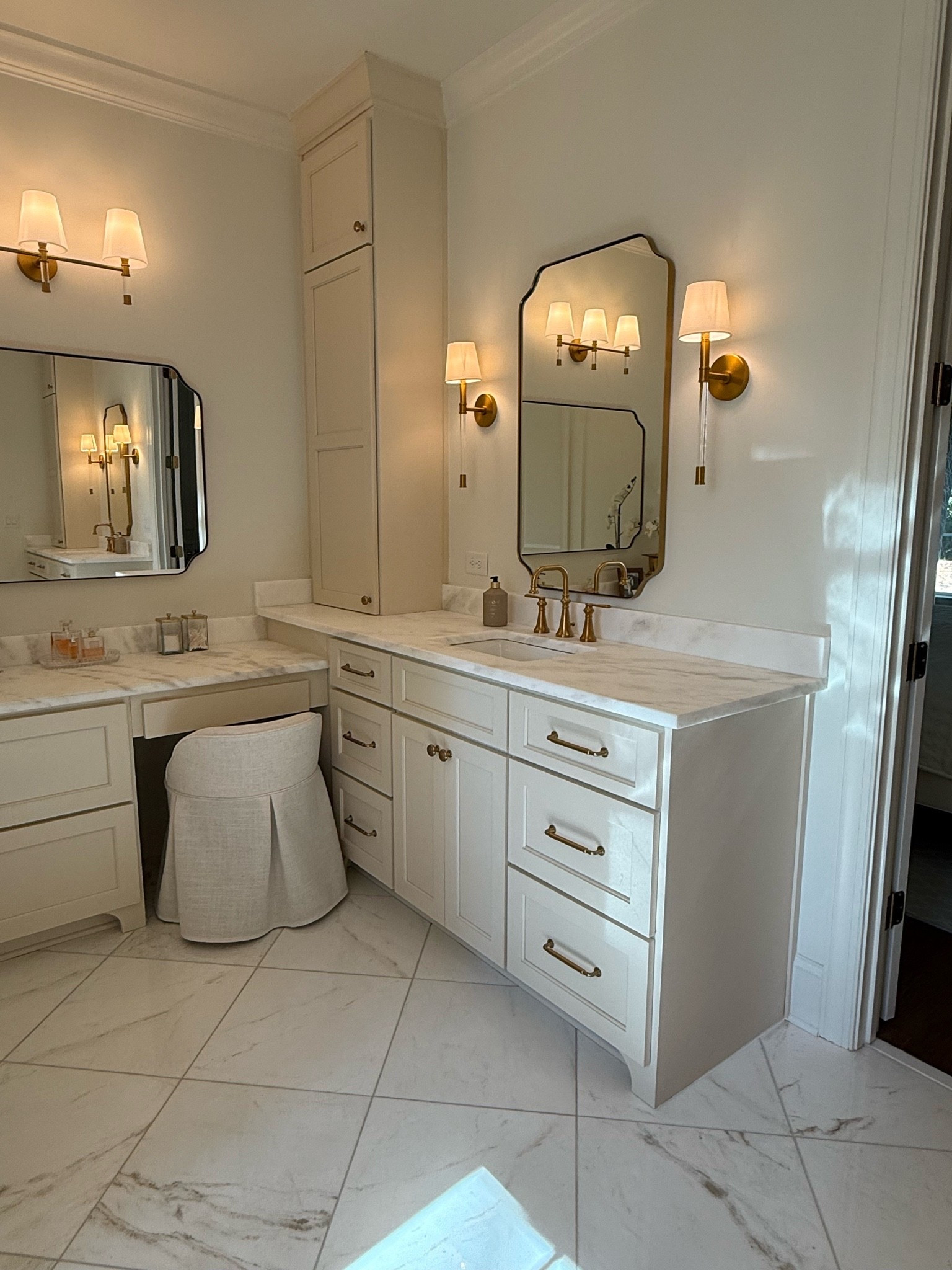 Love the soft light and creamy tones! Wall color is BM Swiss Coffee and cabinet color is SW Natural Linen! Linking my hardware and fixtures!

#LTKdayinmylife #LTKHome #LTKselfcare