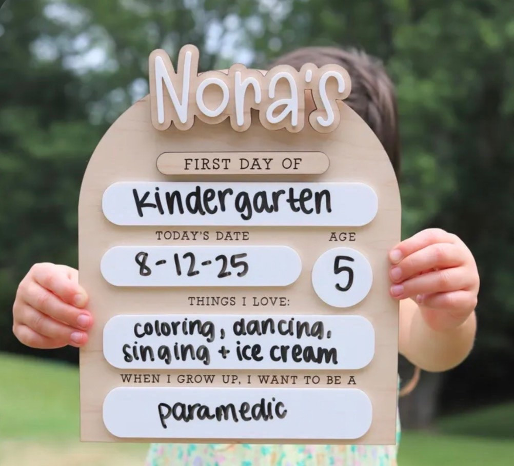 This modern, reusable arched back-to-school milestone sign will make those first and last day of school memories extra special! 100% hand crafted with care in our studio and designed for both style and functionality, this sign is the perfect photo prop and keepsake for your growing student.

+ DETAILS:
-Size: 8.5 x 10 inches without name. Names will vary but will be no wider than 6.5"
-Materials: Wood base with acrylic dry-erase sections
-Customization: Add your child’s name (removable via hook and loop fasteners). Choose from 1-4 Velcro names. Additional names can also be purchased.
-Font Options: Choose from 6 fun and stylish fonts
-Color Options: 18 vibrant colors to match your child’s personality
-Dry Erase Sections: Fill in details like:
-Today's Date
-Age
-Favorite Things
-What your child wants to be when they grow up

Dual Use: Includes interchangeable velcro pieces that say “First Day of School” and “Last Day of School” so that it can be used to its full potential!

-Perfect for First & Last Day Photos
Use year after year—just wipe and write! A timeless addition to your back-to-school traditions.

#LTKKids #LTKSeasonal #LTKmomlife