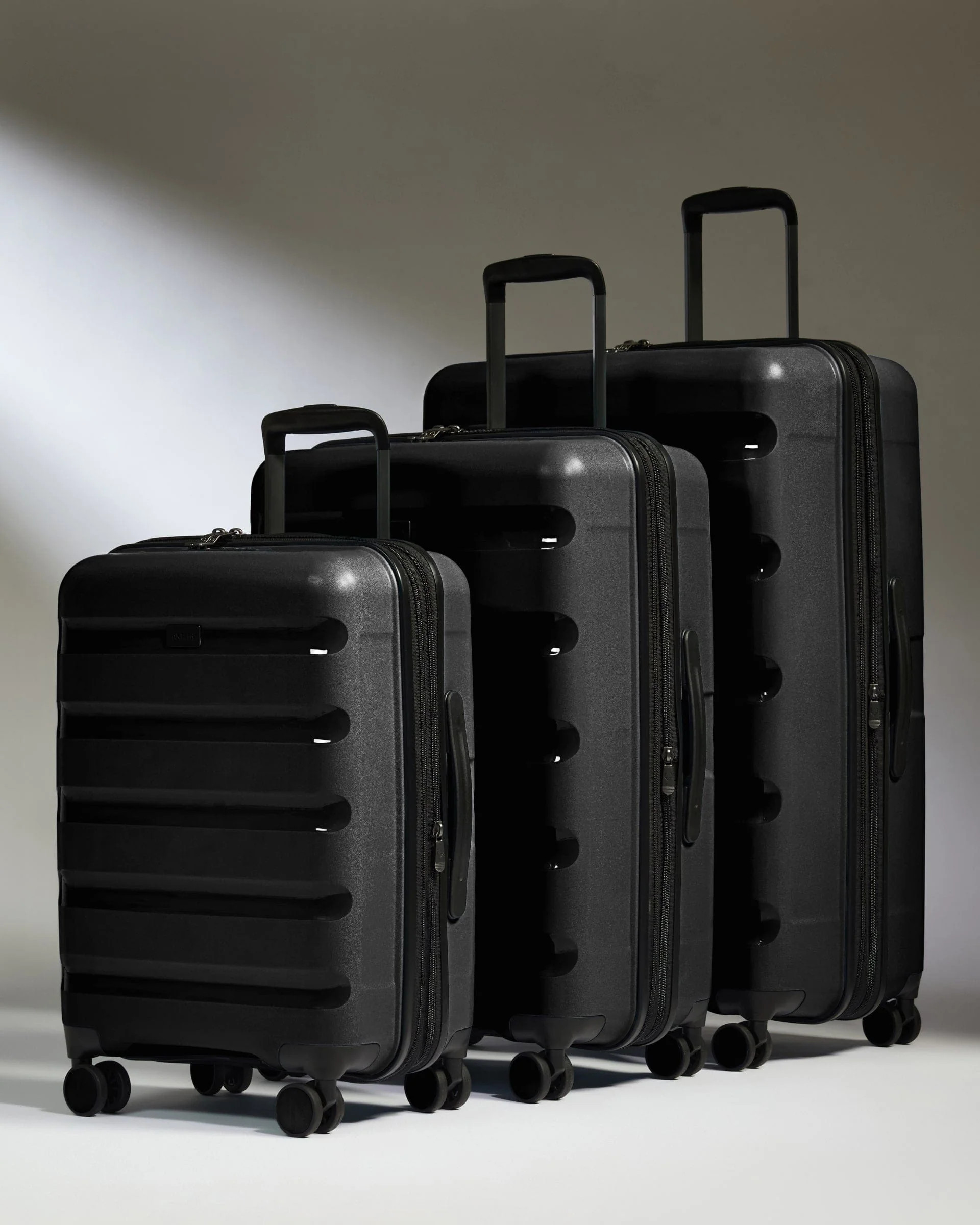 Expander Cabin Suitcase Set of 3 Black - Logo Stripe | Lightweight Hard Shell Luggage | Antler UK