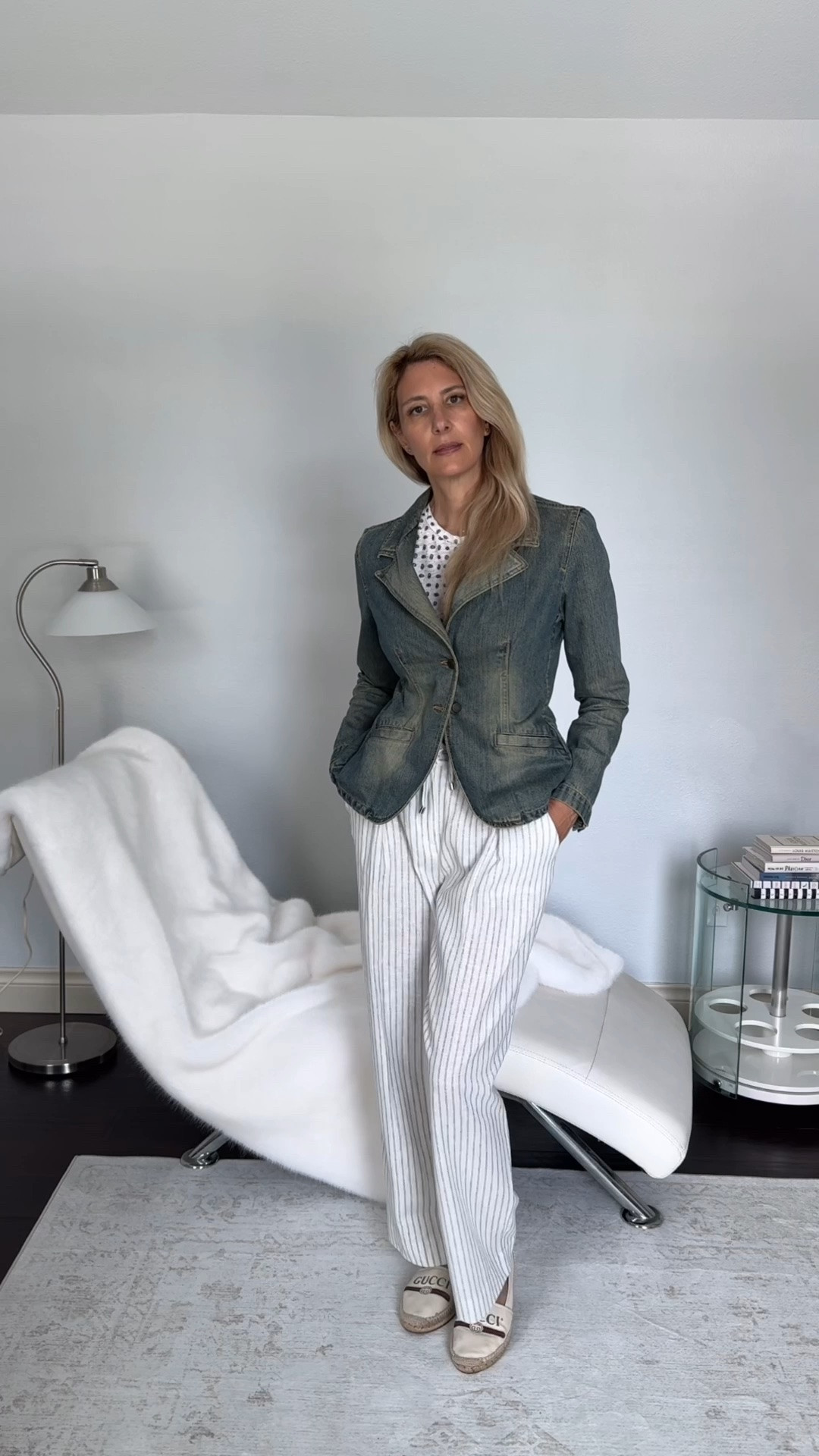 Styling these DKNY striped pants on sale with a printed top in similar tones so the prints complement each other rather than compete. Perfect to go straight to exploring mode when you land after dropping off luggage. Adding a scarf - always a yes for me. It's both a finishing touch and an essential for the pilots that prefer cold temps in the cabin.

What's one travel essential you can't leave home without?

#LTKSaleAlert #LTKTravel #LTKTall