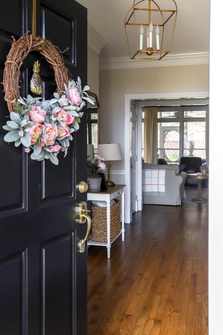 I love this beautiful peony wreath on my front door. It coordinates with other pink accents in the entry and living area.

#LTKhome #LTKSeasonal