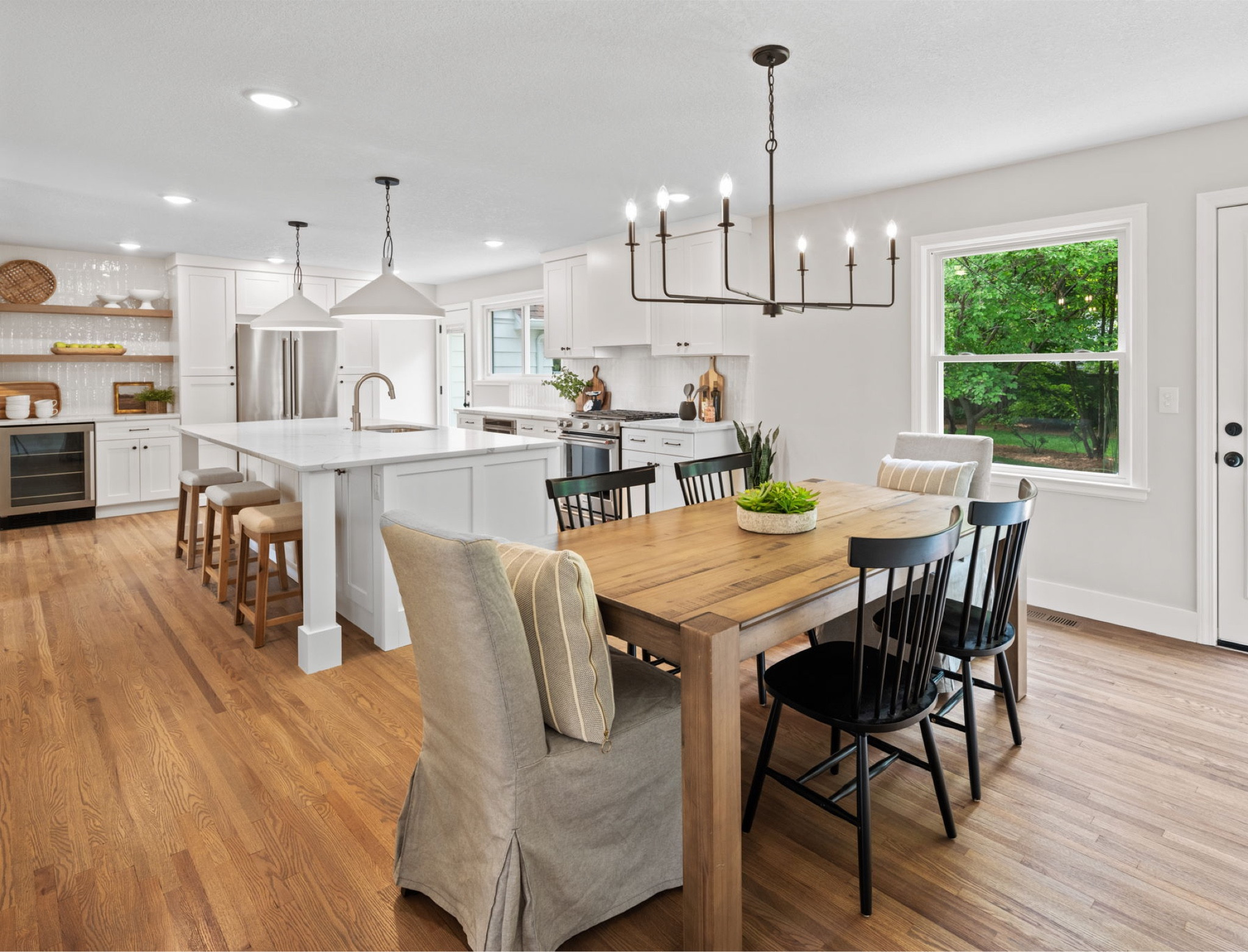 Most asked about items from this kitchen are the lights.  These pendants are a great designer dupe at a fraction of the price.  And the oversized chandelier balances the dining area.  Lighting does make a space. 

#LTKstyletip #LTKhome