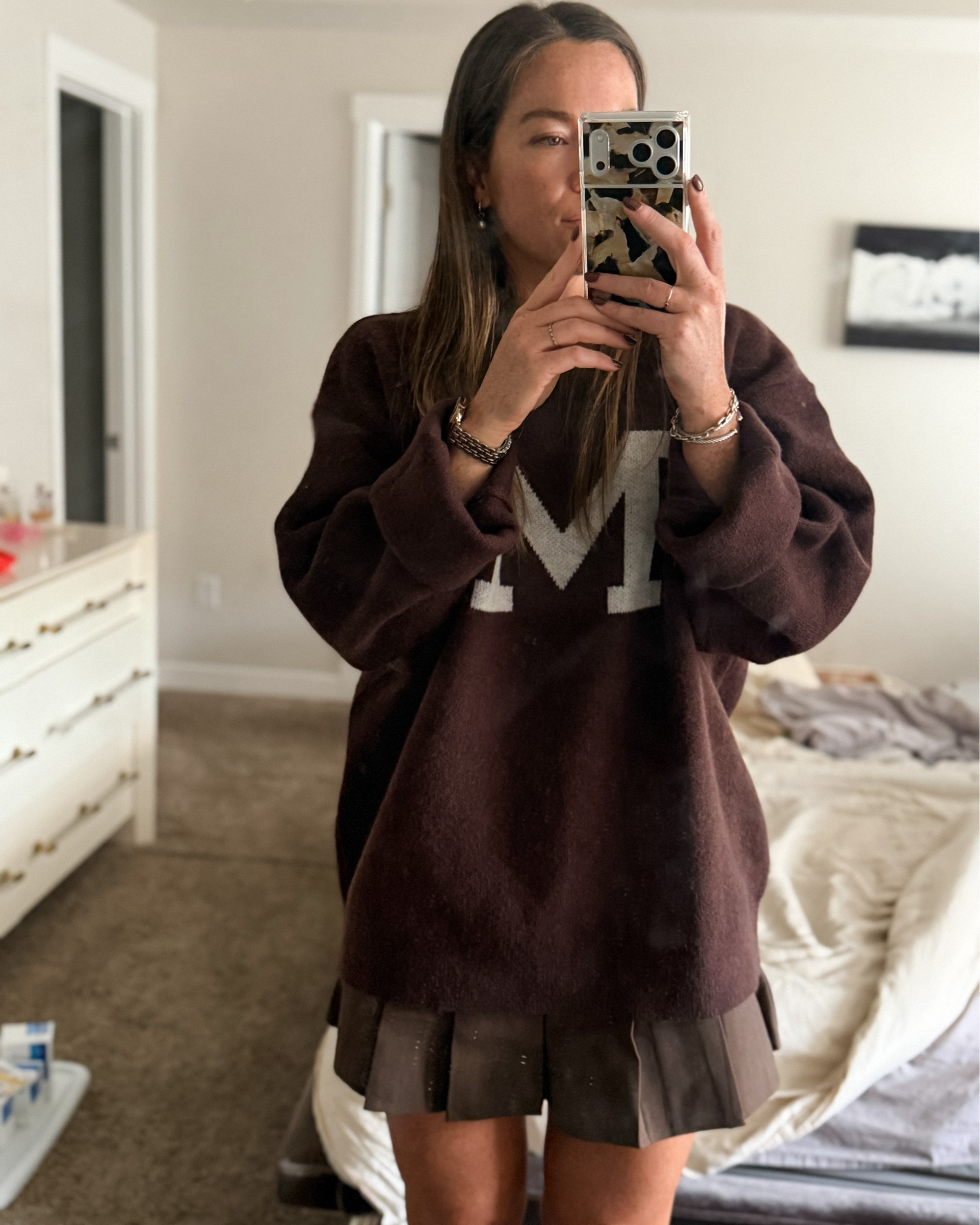 Wearing a large in the sweater for a big oversized fit! 
Skirt is a little snug in the waist. If in between sizes, do not size down :)

#LTKSeasonal #LTKStyleTip #LTKFindsUnder100