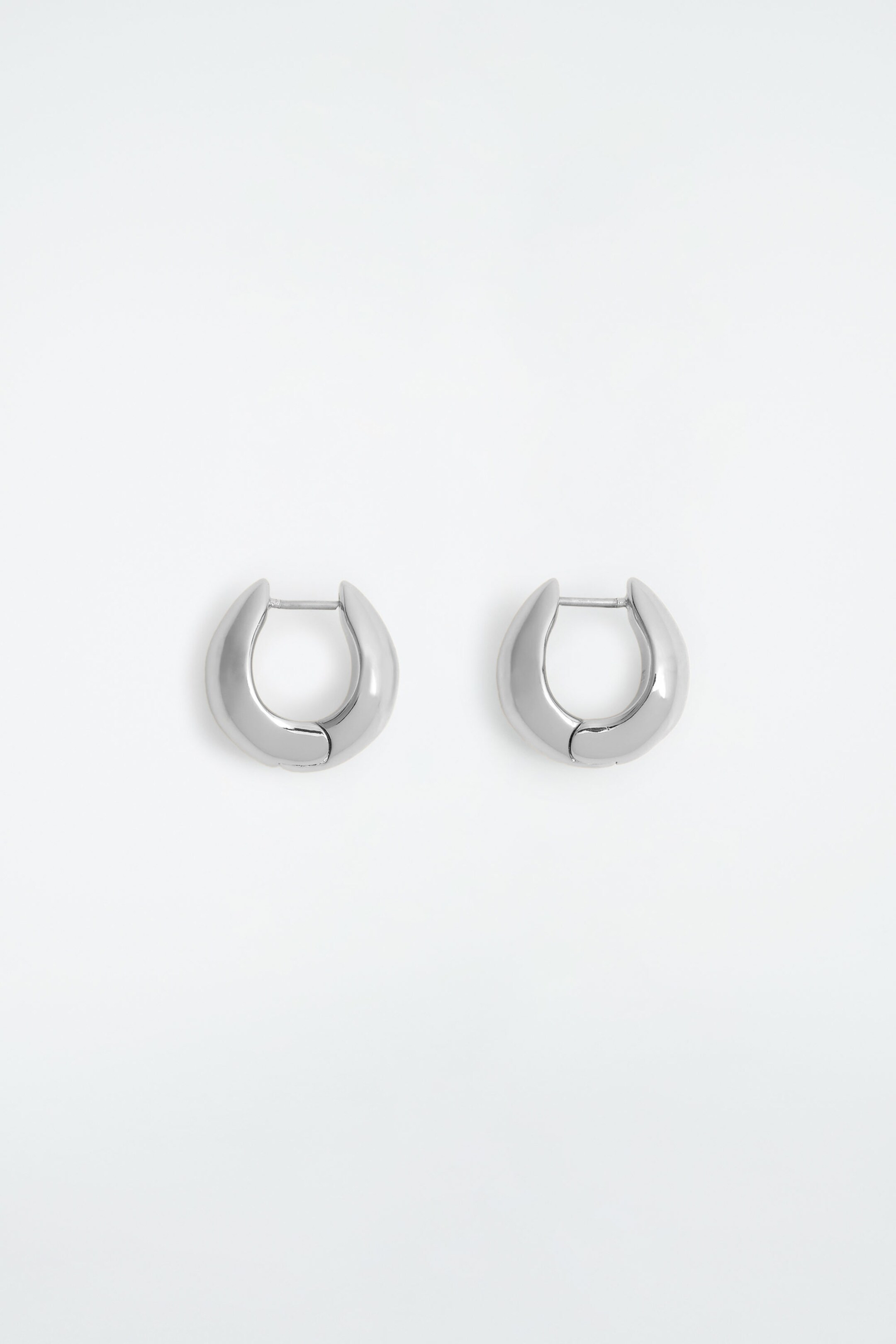 MINI CURVED HOOP EARRINGS - SILVER | COS UK