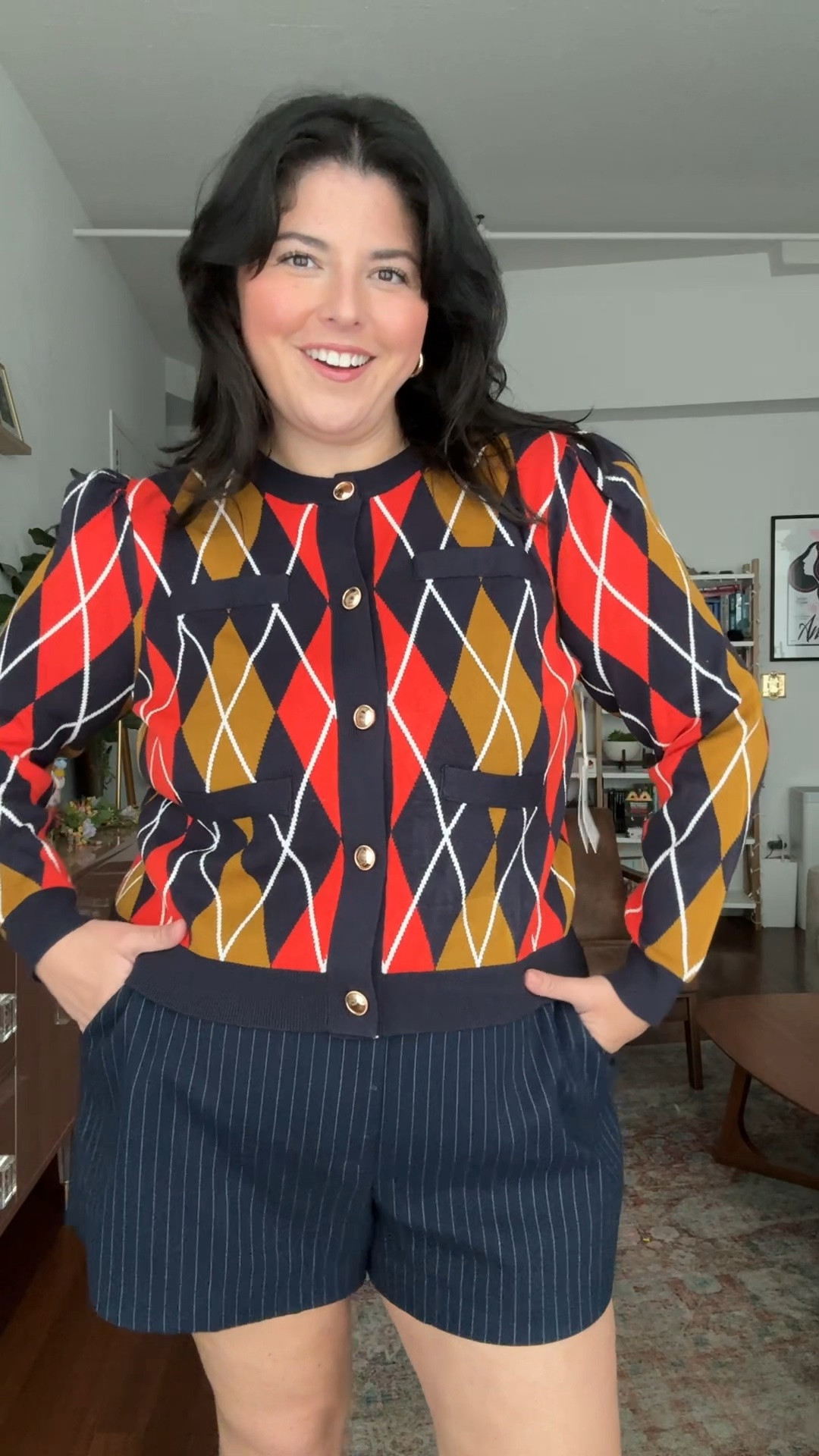Argyle cardigan in a bold color scheme - it’s perfect for fall! Imagine going to a pumpkin patch with this on.  I’m wearing a size xl!

#LTKPlusSize #LTKxWalmart #LTKWorkwear