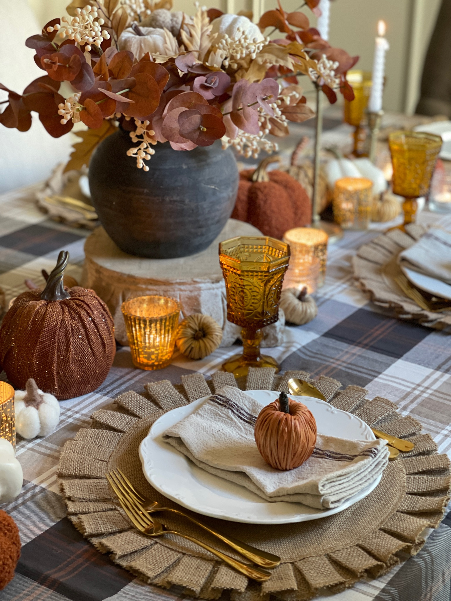 Cozy Autumn Dining

Use faux pumpkins (with color or texture) and real pumpkins with deep orange tones, or white ones scattered down the center. Tucking in votive candles.

Fall tablescape, Autumn tablescape, Fall decor, amber glassware, burlap placemats, votive candles 

#LTKhome #LTKSeasonal