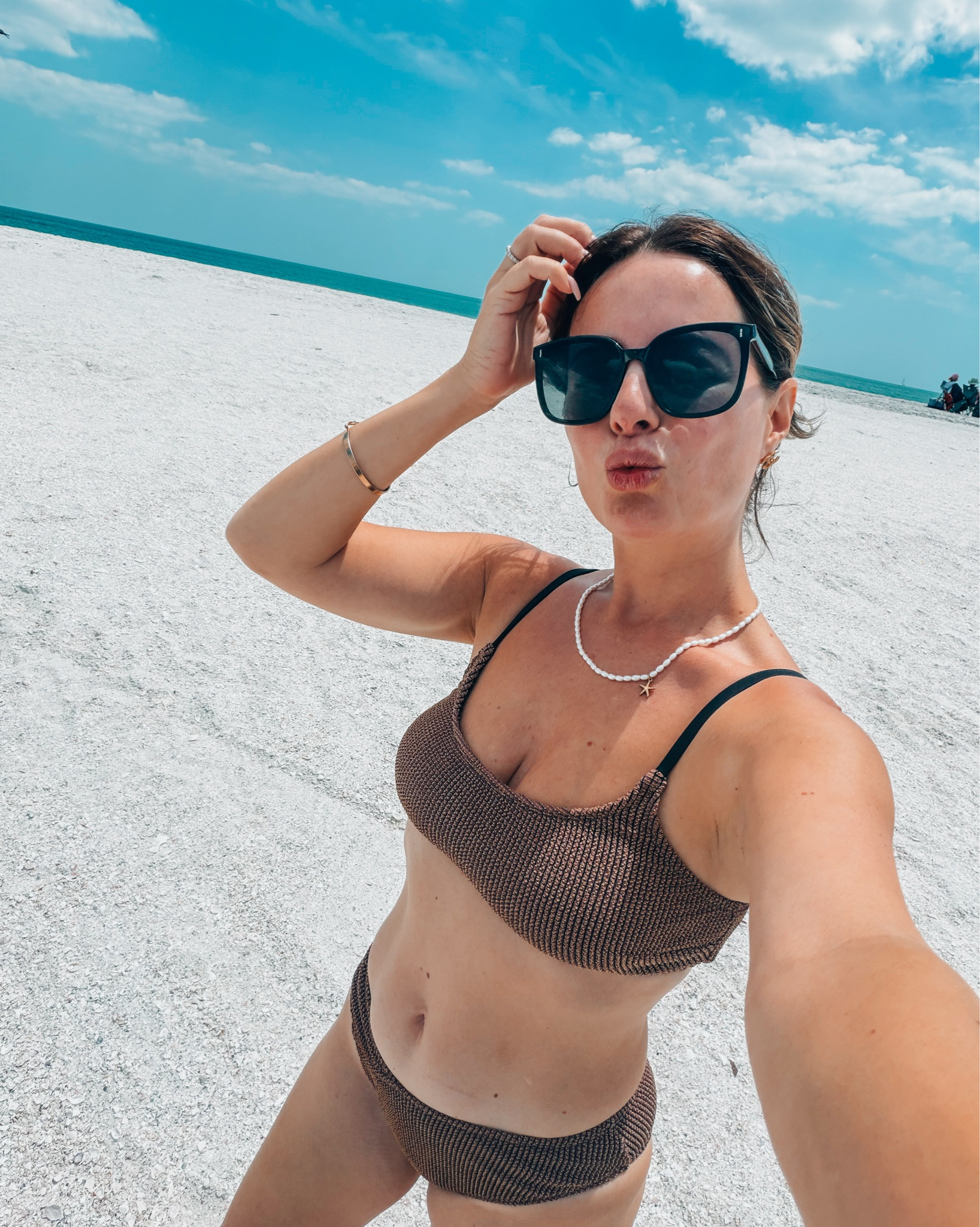 Boat day vibes 🤎🥥 love this bikini from @Cupshe ilda15 will get you 15% off orders over $69 — I’m wearing a small and fits tts— plus cover up is from there too! 

#LTKSwim #LTKTravel #LTKdayinmylife