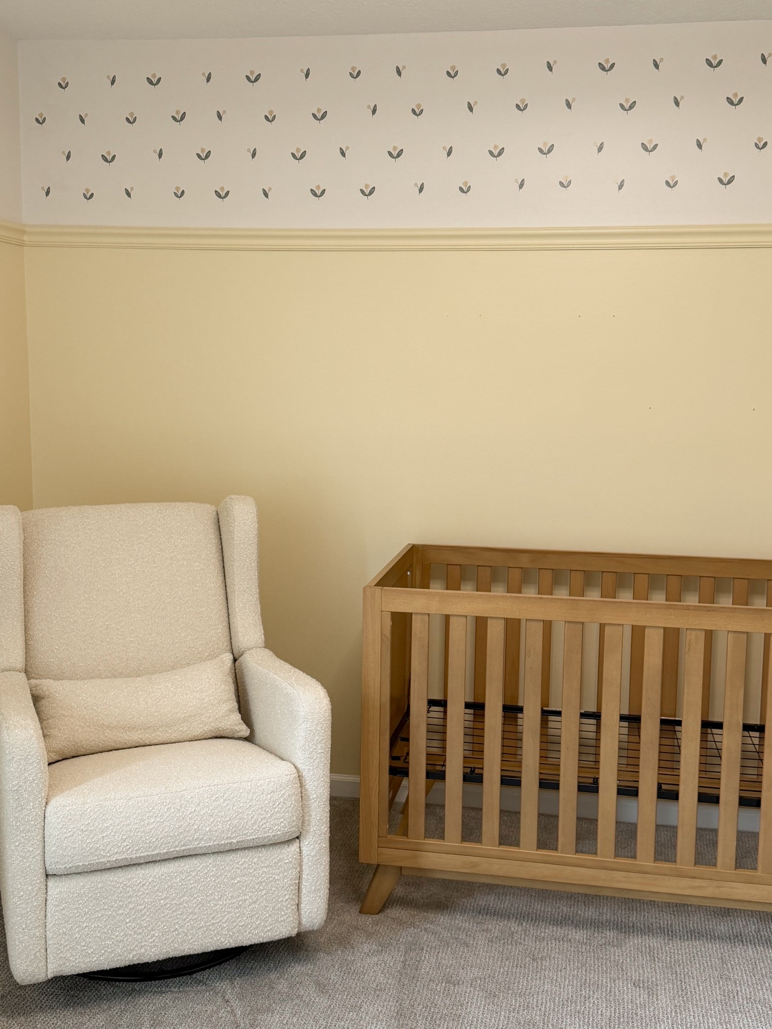 Yellow floral baby girl nursery 🌼🦢🧺🍼

Paint color is candlewick by behr. The flowers are wall decals, they were so easy to put up! 

#LTKBaby
