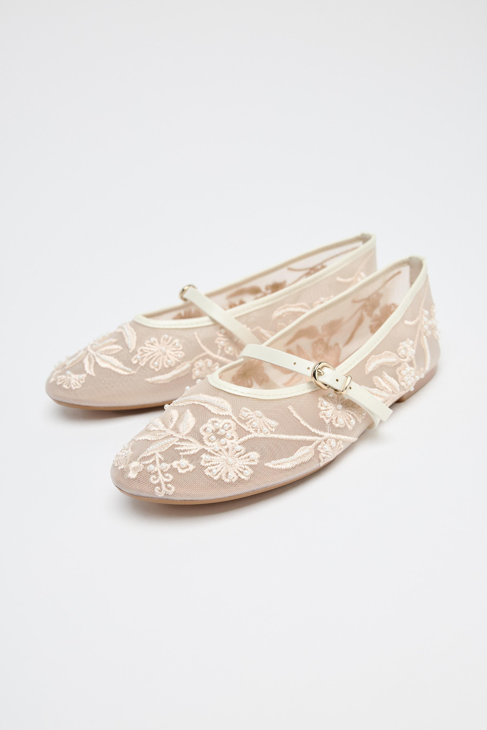 Ballet flat. Mesh upper with embroidery and pearl details. Front buckle strap. Round toe.Sole hei... | Zara US