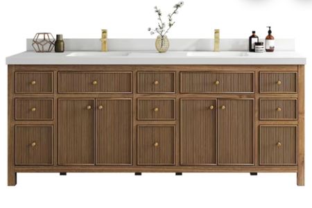 This custom-looking bathroom vanity was the perfect fit for our client’s bathroom project. The reeded / fluted detail of the cabinets are gorgeous and the brass knobs are top notch. Love the natural wood tone for a variety of styles.



#LTKFind #LTKstyletip #LTKhome