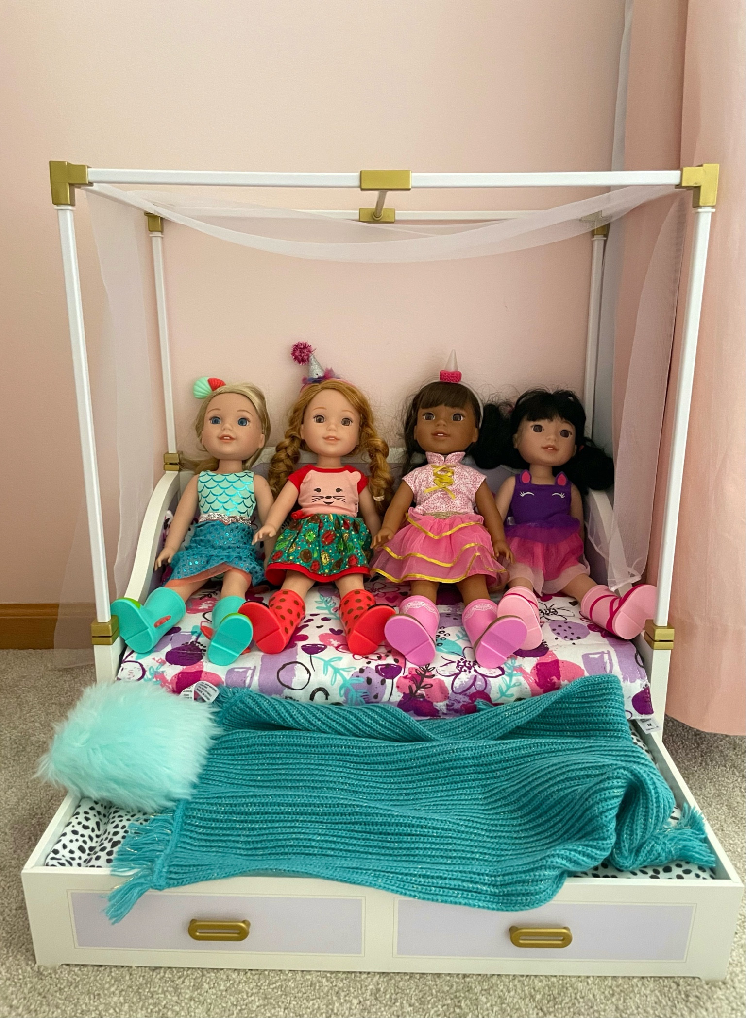 Ellie’s Wellie Wisher setup.
I love this sweet bed she got for Christmas from my mom. It’s stores the dolls and is a great play spot too. 