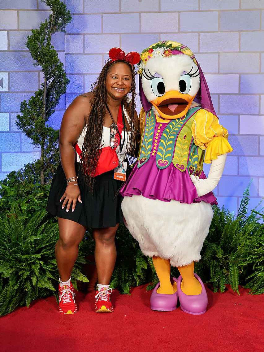 A very important meeting with Daisy Duck.
Smiling this big for a reason! Moments like this never get old.

Wore comfy sneakers, a lightweight skirt, and an easy top so I could walk around all day and still feel cute. Linked what I wore here 

 #LTKdayinmylife #LTKMidsize #LTKPetite