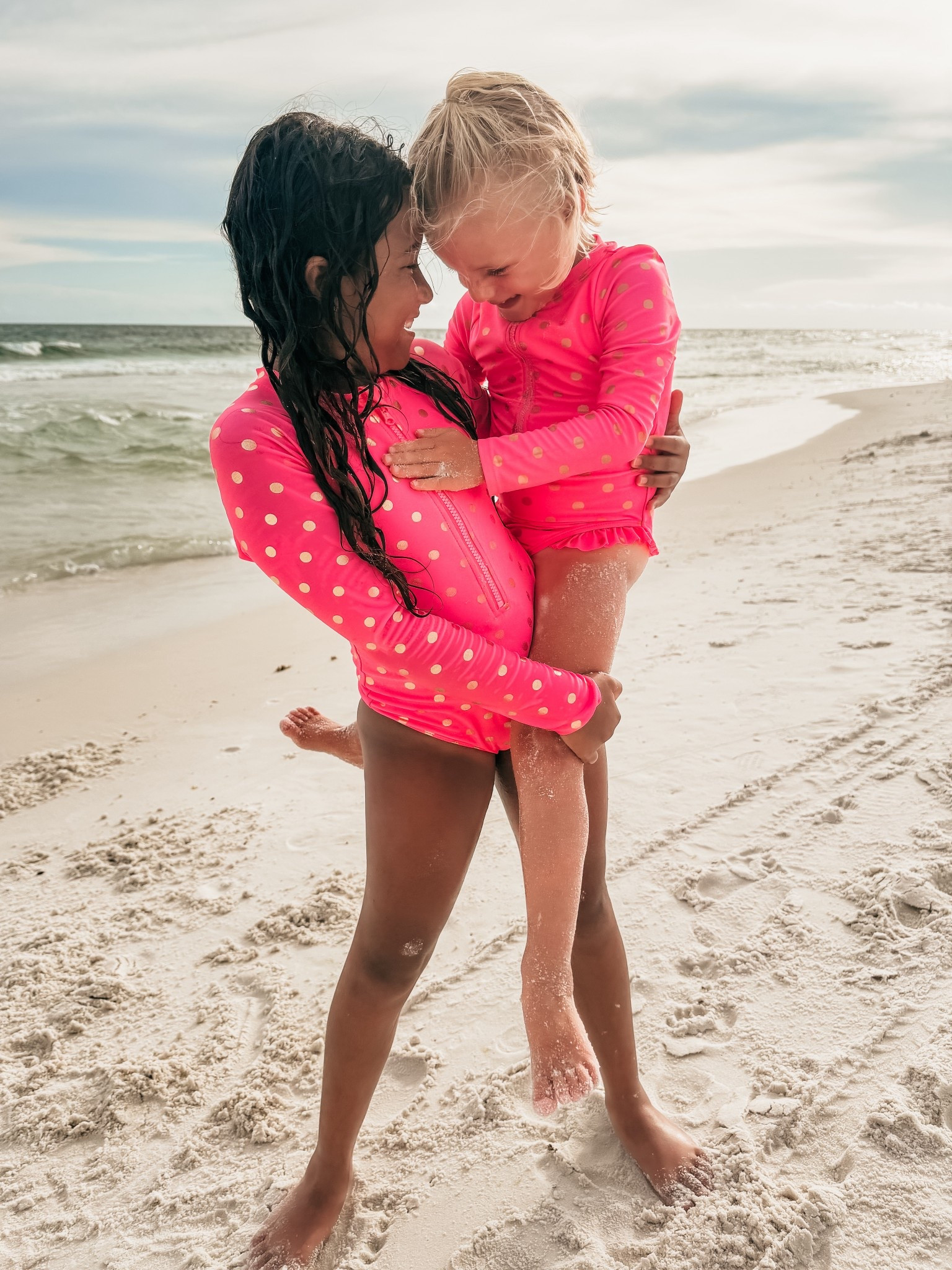 Love these fluorescent rash guard one pieces! 