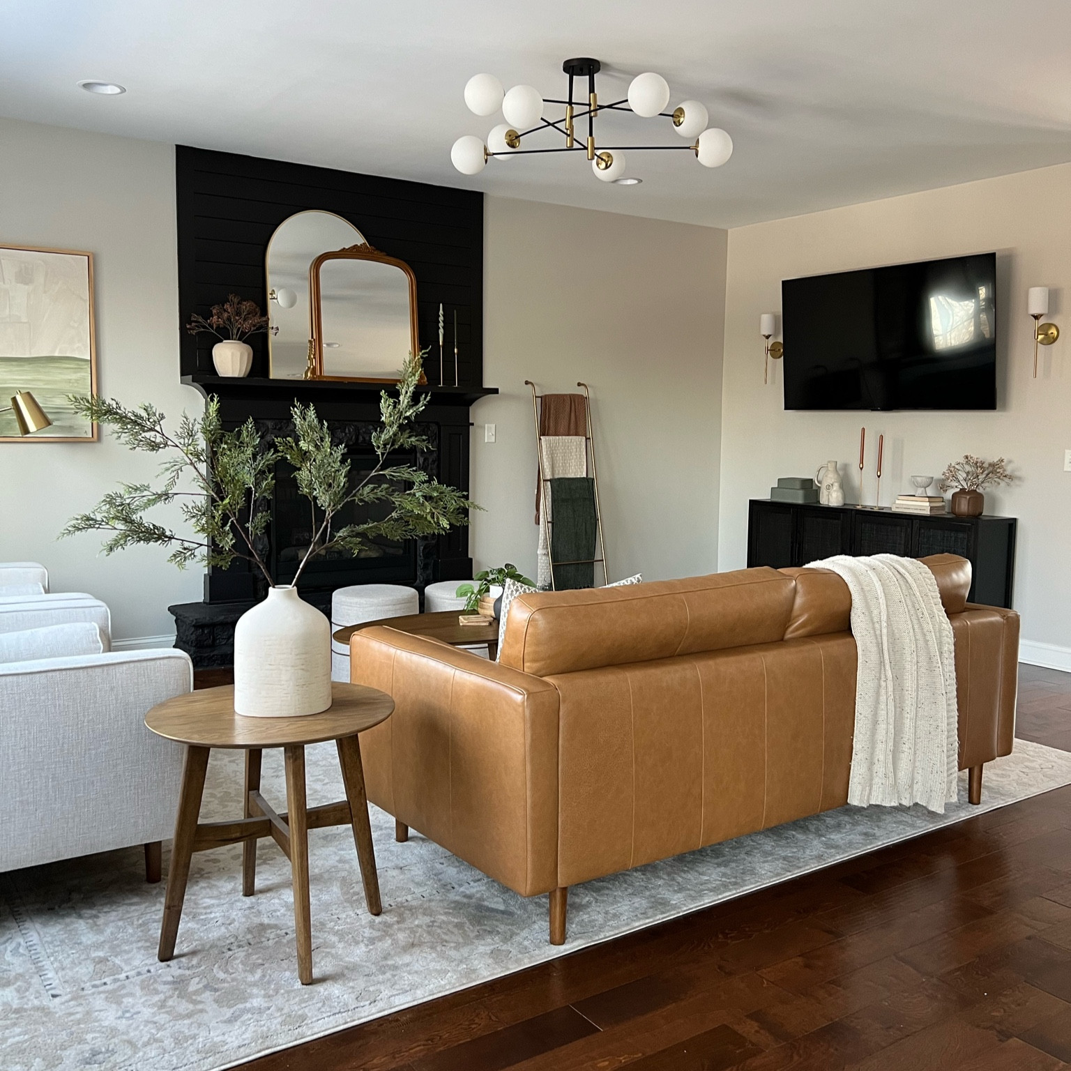 Living room decor, couch, chairs, sconces, rug, side table, coffee tablee

#LTKhome #LTKfindsunder50 #LTKfindsunder100