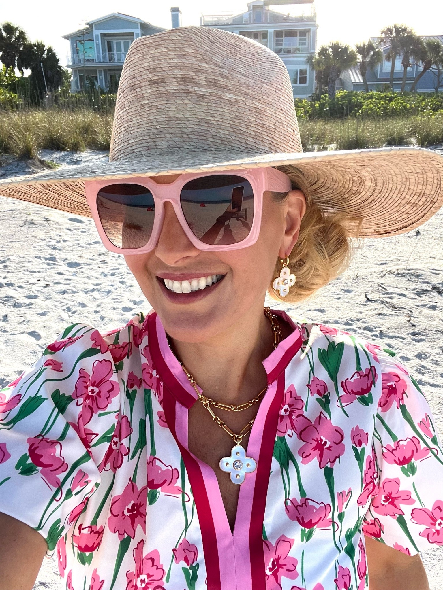 Obsessed with my Julie Vos jewelry. Just look at this mother of pearl necklace and earrings. They will make the best graduation Day gift and the perfect summer jewelry!

Also, my pink floral dress is perfect for a beach resort. I’m wearing it over my swimsuit.

Wearing a medium and fits true to size.

Don’t forget to add the straw hat, sandals and sunglasses to complete this beach resort look!