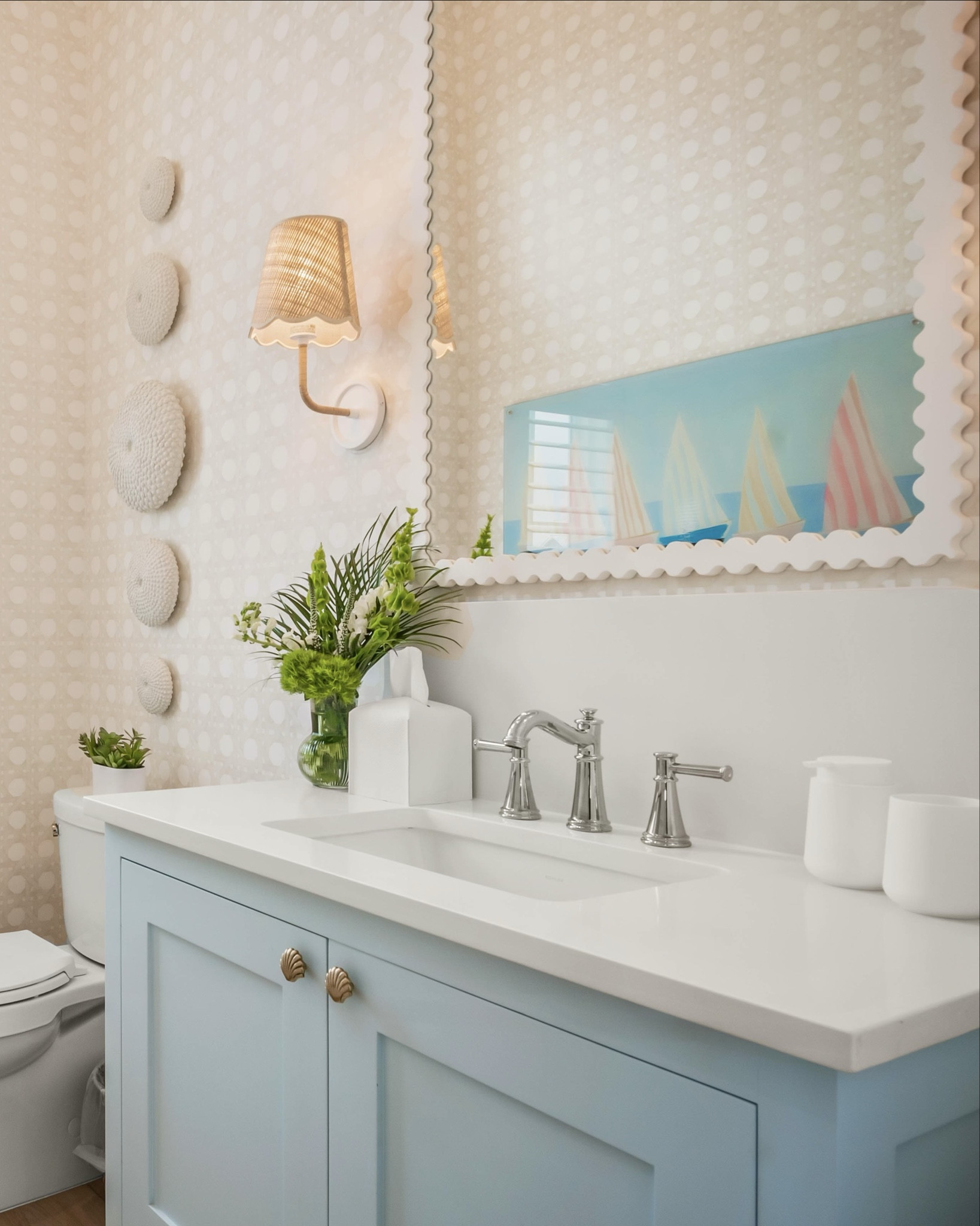 Salt in the air & style everywhere. 🌊✨
This powder bath brings all the coastal charm with Serena & Lily wallpaper and sconces, and Bashful Blue by Benjamin Moore 💙

#Coastal #Bathroom 